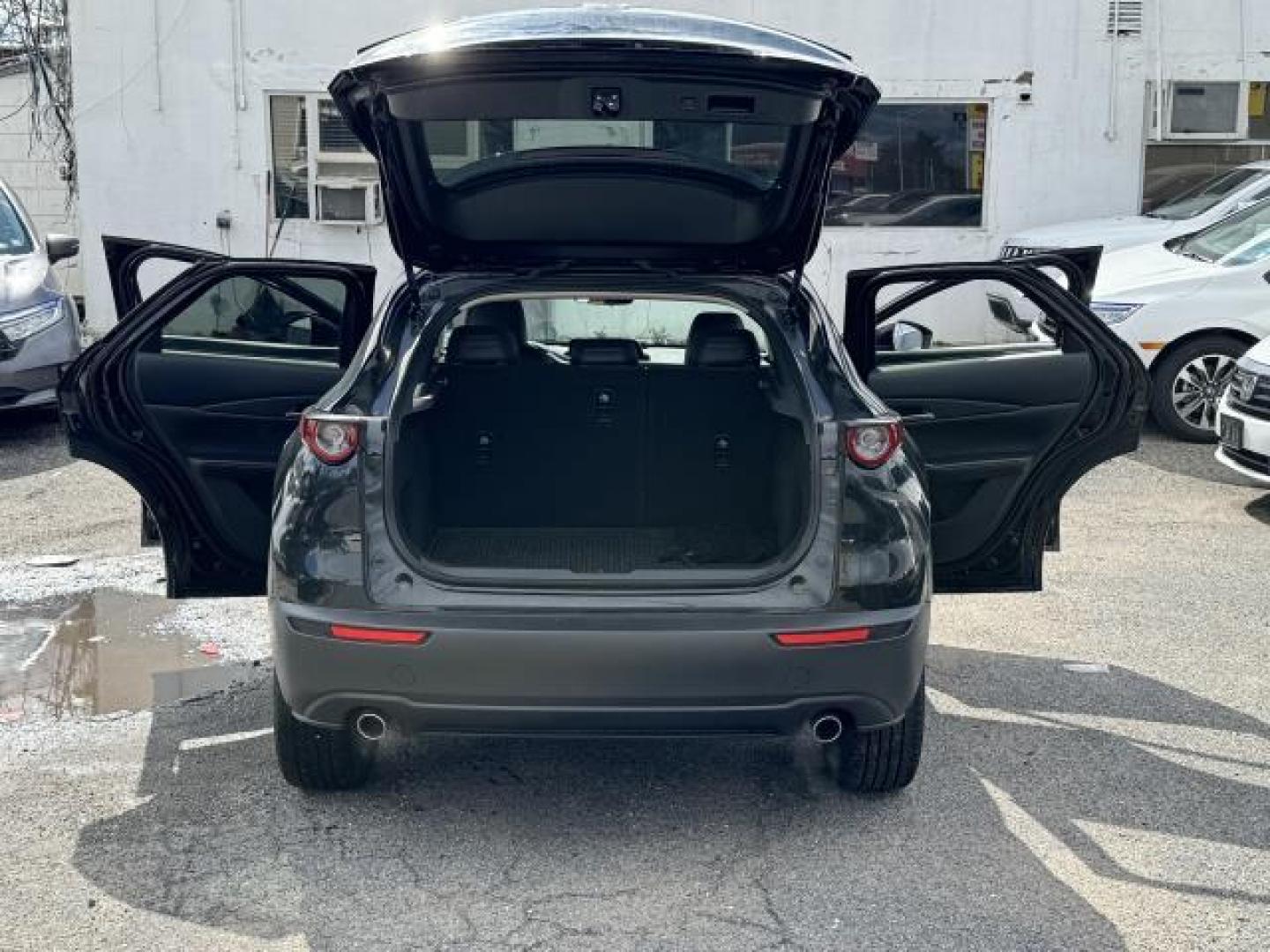 2022 Jet Black Mica /Black Mazda CX-30 2.5 S Select Package AWD (3MVDMBBLXNM) , Manual transmission, located at 1696 Sunrise Hwy, Bay Shore, NY, 11706, (516) 557-0557, 40.733665, -73.256317 - You'll have a memorable drive every time you start this 2022 Mazda CX-30 up. This CX-30 has 11632 miles, and it has plenty more to go with you behind the wheel. With more vehicles and deals than you know what to do with, you'll love the options we have for you. With an affordable price, why wait an - Photo#10