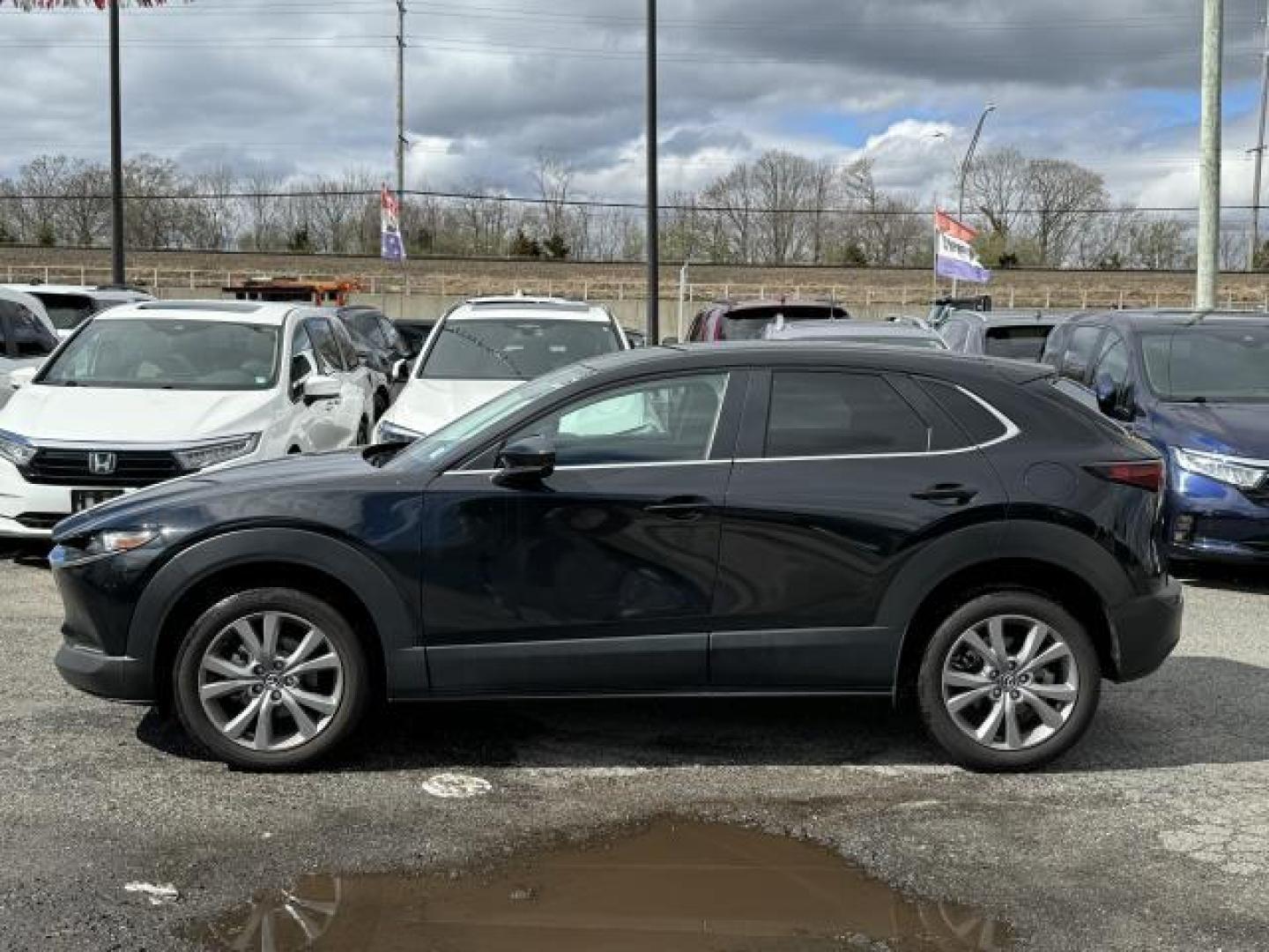 2022 Jet Black Mica /Black Mazda CX-30 2.5 S Select Package AWD (3MVDMBBLXNM) , Manual transmission, located at 1696 Sunrise Hwy, Bay Shore, NY, 11706, (516) 557-0557, 40.733665, -73.256317 - You'll have a memorable drive every time you start this 2022 Mazda CX-30 up. This CX-30 has 11632 miles, and it has plenty more to go with you behind the wheel. With more vehicles and deals than you know what to do with, you'll love the options we have for you. With an affordable price, why wait an - Photo#12