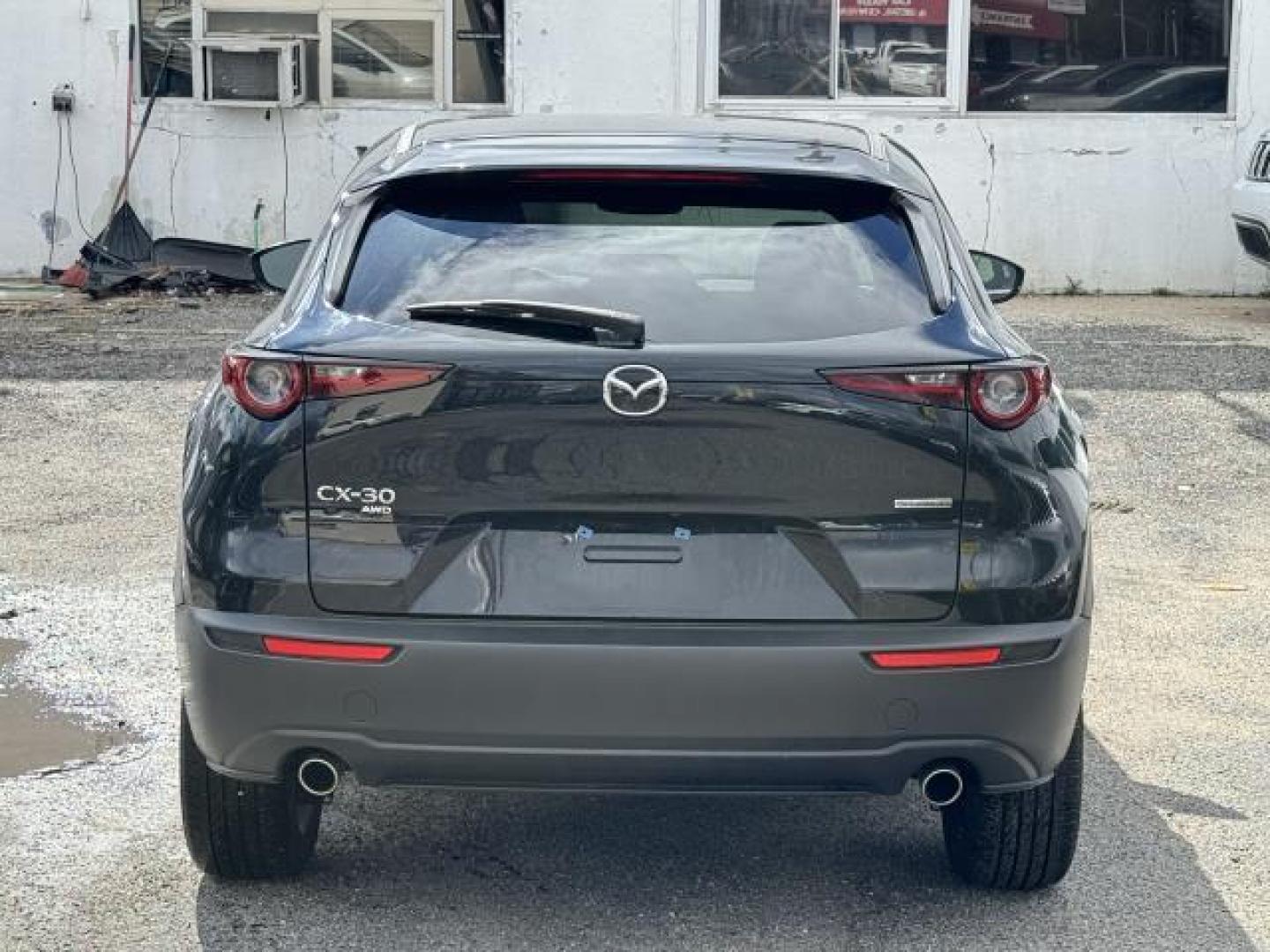 2022 Jet Black Mica /Black Mazda CX-30 2.5 S Select Package AWD (3MVDMBBLXNM) , Manual transmission, located at 1696 Sunrise Hwy, Bay Shore, NY, 11706, (516) 557-0557, 40.733665, -73.256317 - You'll have a memorable drive every time you start this 2022 Mazda CX-30 up. This CX-30 has 11632 miles, and it has plenty more to go with you behind the wheel. With more vehicles and deals than you know what to do with, you'll love the options we have for you. With an affordable price, why wait an - Photo#13