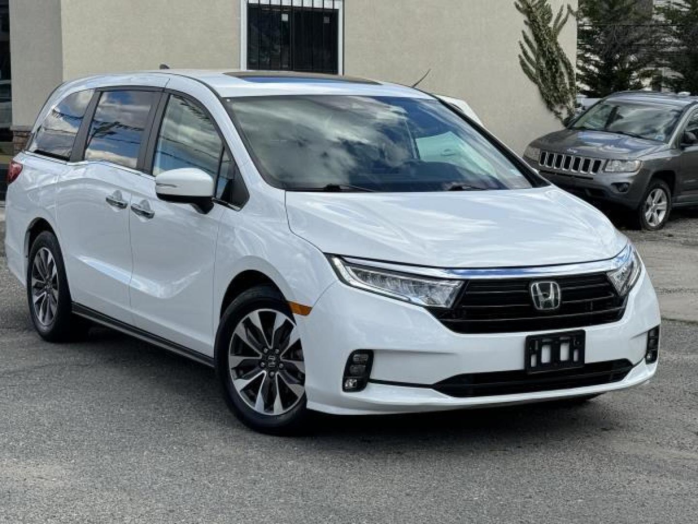 2021 Platinum White Pearl /Beige Honda Odyssey EX-L Auto (5FNRL6H70MB) , Automatic transmission, located at 1696 Sunrise Hwy, Bay Shore, NY, 11706, (516) 557-0557, 40.733665, -73.256317 - Photo#0