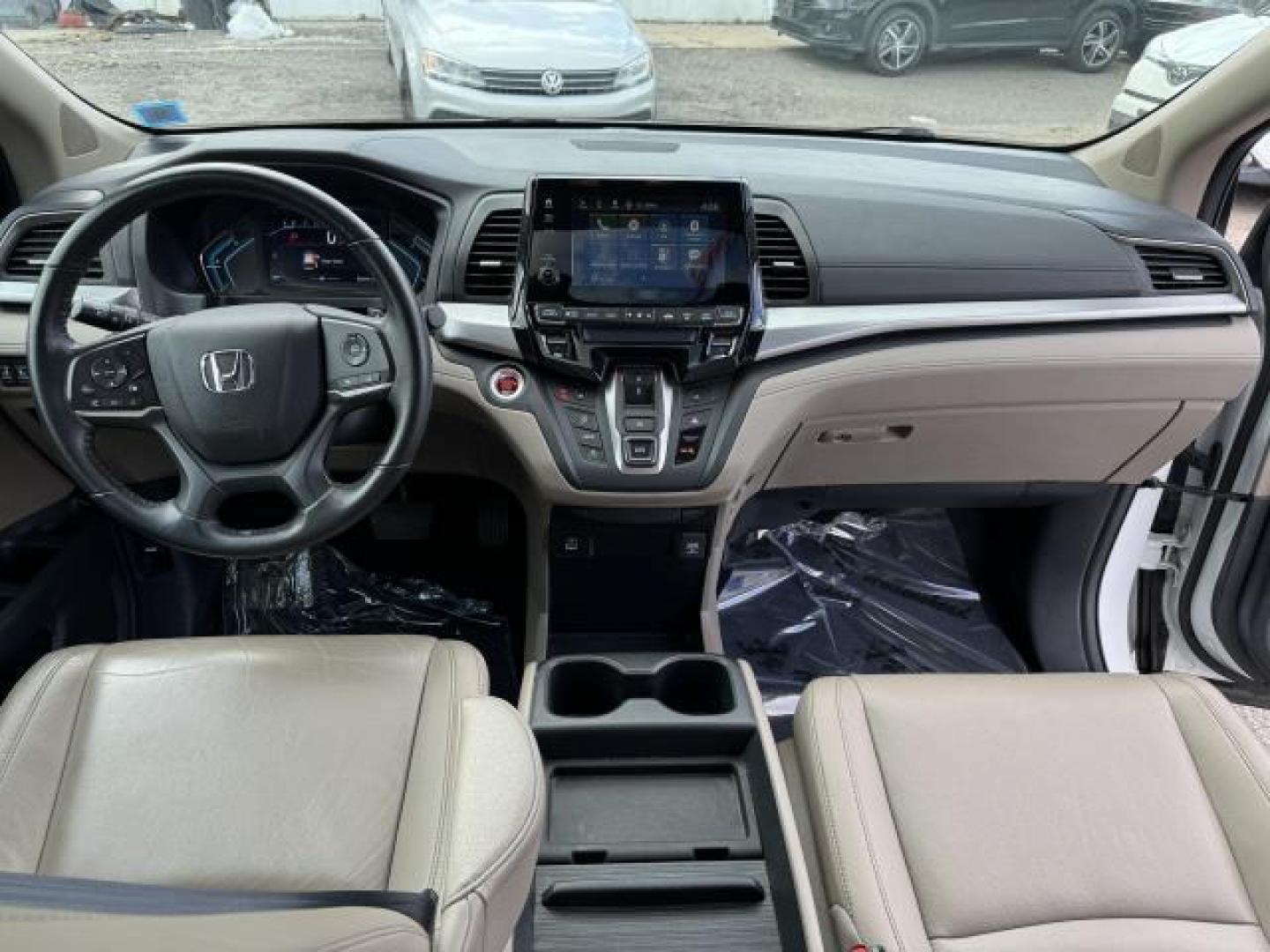 2021 Platinum White Pearl /Beige Honda Odyssey EX-L Auto (5FNRL6H70MB) , Automatic transmission, located at 1696 Sunrise Hwy, Bay Shore, NY, 11706, (516) 557-0557, 40.733665, -73.256317 - This 2021 Honda Odyssey is in great mechanical and physical condition. This Odyssey has traveled 22545 miles, and is ready for you to drive it for many more. Your happiness is our No. 1 priority. Don't risk the regrets. Test drive it today! All internet purchases include a 12 mo/ 12000 mile protect - Photo#9