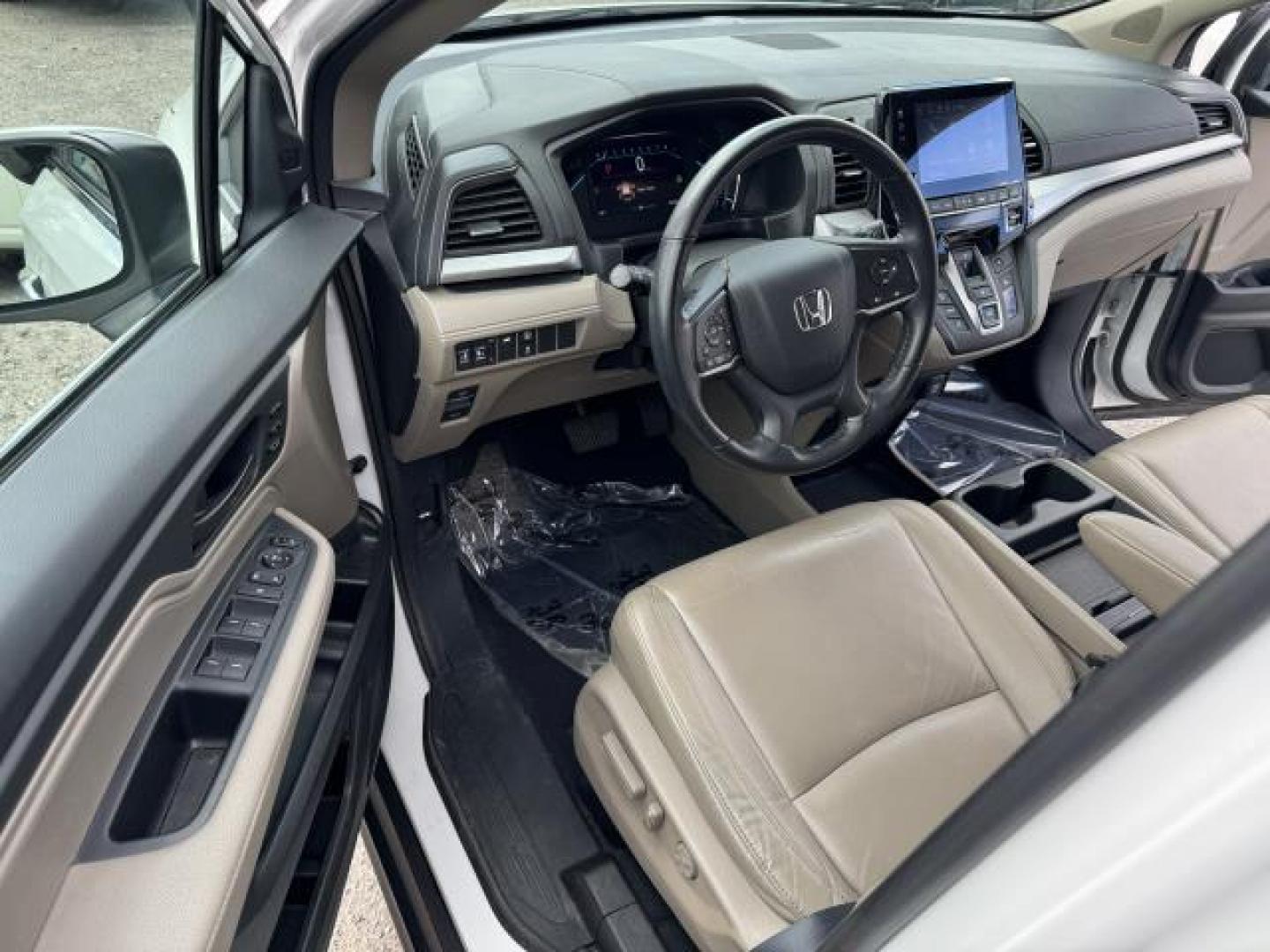 2021 Platinum White Pearl /Beige Honda Odyssey EX-L Auto (5FNRL6H70MB) , Automatic transmission, located at 1696 Sunrise Hwy, Bay Shore, NY, 11706, (516) 557-0557, 40.733665, -73.256317 - This 2021 Honda Odyssey is in great mechanical and physical condition. This Odyssey has traveled 22545 miles, and is ready for you to drive it for many more. Your happiness is our No. 1 priority. Don't risk the regrets. Test drive it today! All internet purchases include a 12 mo/ 12000 mile protect - Photo#23