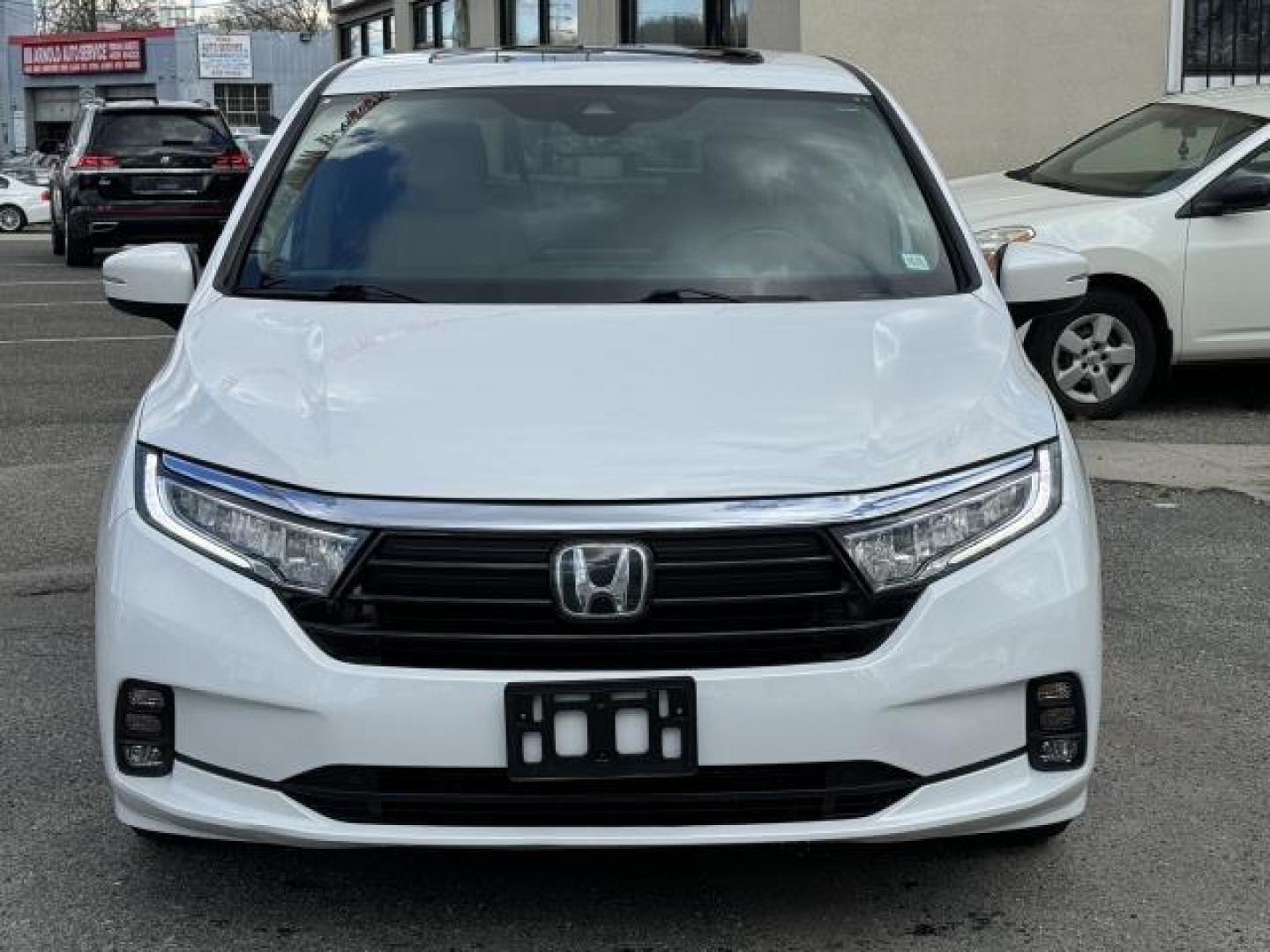 2021 Platinum White Pearl /Beige Honda Odyssey EX-L Auto (5FNRL6H70MB) , Automatic transmission, located at 1696 Sunrise Hwy, Bay Shore, NY, 11706, (516) 557-0557, 40.733665, -73.256317 - Photo#2