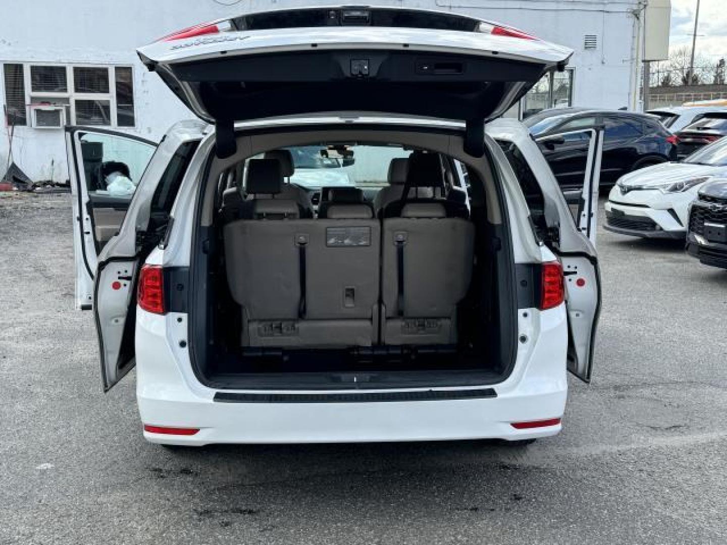 2021 Platinum White Pearl /Beige Honda Odyssey EX-L Auto (5FNRL6H70MB) , Automatic transmission, located at 1696 Sunrise Hwy, Bay Shore, NY, 11706, (516) 557-0557, 40.733665, -73.256317 - This 2021 Honda Odyssey is in great mechanical and physical condition. This Odyssey has traveled 22545 miles, and is ready for you to drive it for many more. Your happiness is our No. 1 priority. Don't risk the regrets. Test drive it today! All internet purchases include a 12 mo/ 12000 mile protect - Photo#45