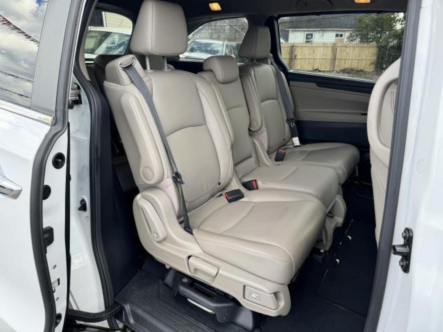 2021 Platinum White Pearl /Beige Honda Odyssey EX-L Auto (5FNRL6H70MB) , Automatic transmission, located at 1696 Sunrise Hwy, Bay Shore, NY, 11706, (516) 557-0557, 40.733665, -73.256317 - This 2021 Honda Odyssey is in great mechanical and physical condition. This Odyssey has traveled 22545 miles, and is ready for you to drive it for many more. Your happiness is our No. 1 priority. Don't risk the regrets. Test drive it today! All internet purchases include a 12 mo/ 12000 mile protect - Photo#6