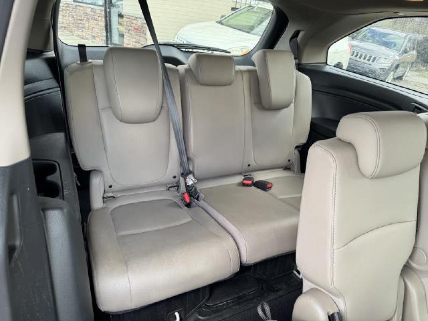 2021 Platinum White Pearl /Beige Honda Odyssey EX-L Auto (5FNRL6H70MB) , Automatic transmission, located at 1696 Sunrise Hwy, Bay Shore, NY, 11706, (516) 557-0557, 40.733665, -73.256317 - This 2021 Honda Odyssey is in great mechanical and physical condition. This Odyssey has traveled 22545 miles, and is ready for you to drive it for many more. Your happiness is our No. 1 priority. Don't risk the regrets. Test drive it today! All internet purchases include a 12 mo/ 12000 mile protect - Photo#7