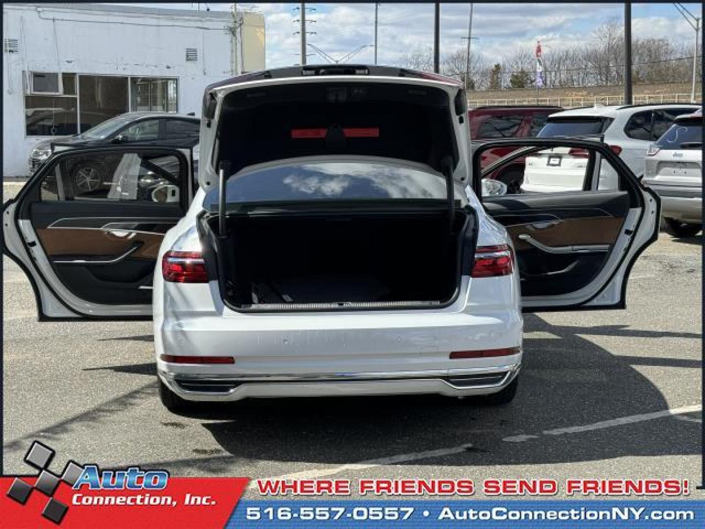 2019 Glacier White Metallic /Nutmeg Brown Audi A8 L 55 TFSI quattro (WAU8DAF88KN) , Automatic transmission, located at 1696 Sunrise Hwy, Bay Shore, NY, 11706, (516) 557-0557, 40.733665, -73.256317 - Photo#48