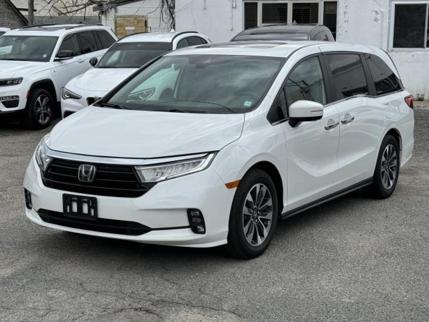 2021 Platinum White Pearl /Black Honda Odyssey EX-L Auto (5FNRL6H73MB) , Automatic transmission, located at 1696 Sunrise Hwy, Bay Shore, NY, 11706, (516) 557-0557, 40.733665, -73.256317 - This 2021 Honda Odyssey is in great mechanical and physical condition. This Odyssey has 22545 miles, and it has plenty more to go with you behind the wheel. We won't sell you a vehicle that we wouldn't sell our family. Stop by the showroom for a test drive; your dream car is waiting! All internet p - Photo#11