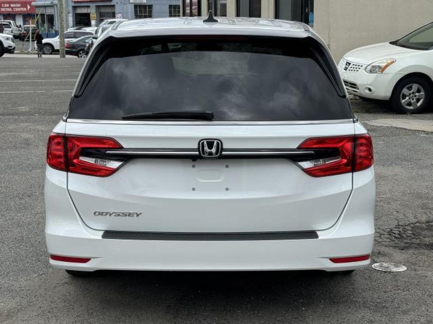 2021 Platinum White Pearl /Black Honda Odyssey EX-L Auto (5FNRL6H73MB) , Automatic transmission, located at 1696 Sunrise Hwy, Bay Shore, NY, 11706, (516) 557-0557, 40.733665, -73.256317 - This 2021 Honda Odyssey is in great mechanical and physical condition. This Odyssey has 22545 miles, and it has plenty more to go with you behind the wheel. We won't sell you a vehicle that we wouldn't sell our family. Stop by the showroom for a test drive; your dream car is waiting! All internet p - Photo#13