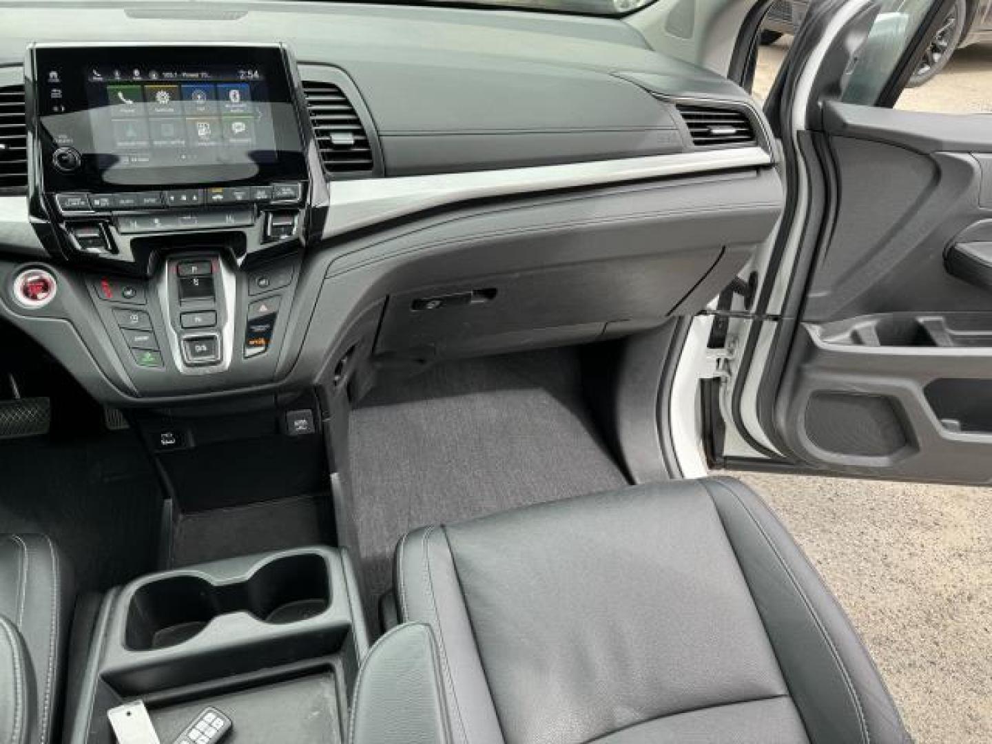 2021 Platinum White Pearl /Black Honda Odyssey EX-L Auto (5FNRL6H73MB) , Automatic transmission, located at 1696 Sunrise Hwy, Bay Shore, NY, 11706, (516) 557-0557, 40.733665, -73.256317 - This 2021 Honda Odyssey is in great mechanical and physical condition. This Odyssey has 22545 miles, and it has plenty more to go with you behind the wheel. We won't sell you a vehicle that we wouldn't sell our family. Stop by the showroom for a test drive; your dream car is waiting! All internet p - Photo#19