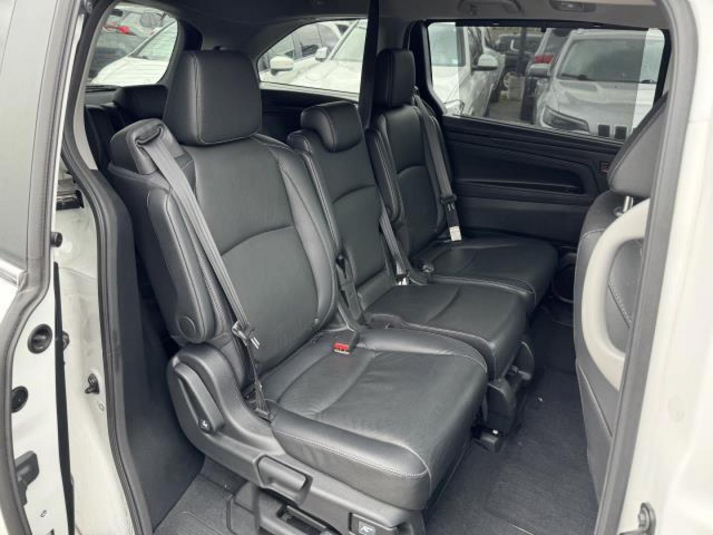 2021 Platinum White Pearl /Black Honda Odyssey EX-L Auto (5FNRL6H73MB) , Automatic transmission, located at 1696 Sunrise Hwy, Bay Shore, NY, 11706, (516) 557-0557, 40.733665, -73.256317 - This 2021 Honda Odyssey is in great mechanical and physical condition. This Odyssey has 22545 miles, and it has plenty more to go with you behind the wheel. We won't sell you a vehicle that we wouldn't sell our family. Stop by the showroom for a test drive; your dream car is waiting! All internet p - Photo#6