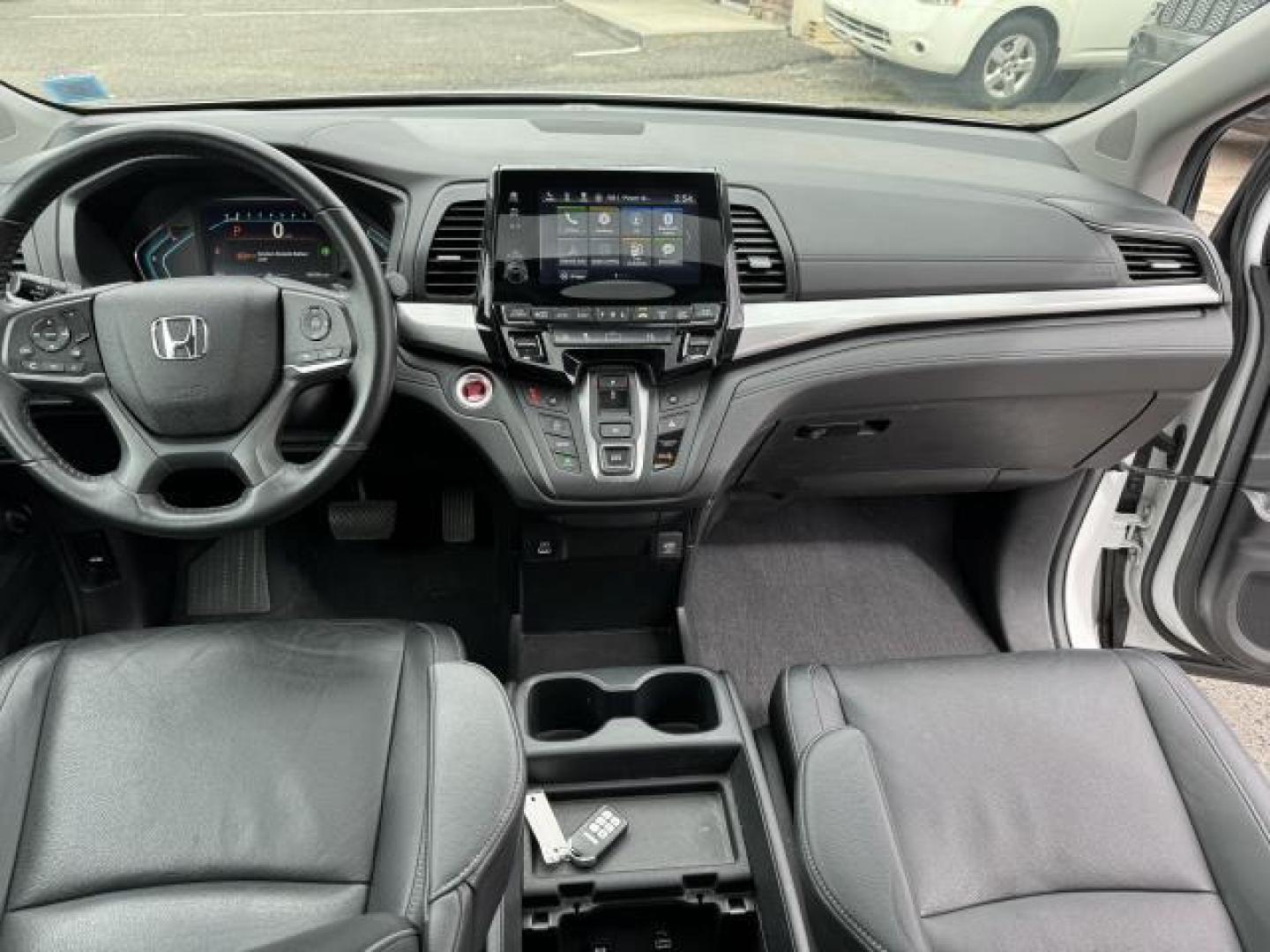 2021 Platinum White Pearl /Black Honda Odyssey EX-L Auto (5FNRL6H73MB) , Automatic transmission, located at 1696 Sunrise Hwy, Bay Shore, NY, 11706, (516) 557-0557, 40.733665, -73.256317 - This 2021 Honda Odyssey is in great mechanical and physical condition. This Odyssey has 22545 miles, and it has plenty more to go with you behind the wheel. We won't sell you a vehicle that we wouldn't sell our family. Stop by the showroom for a test drive; your dream car is waiting! All internet p - Photo#8