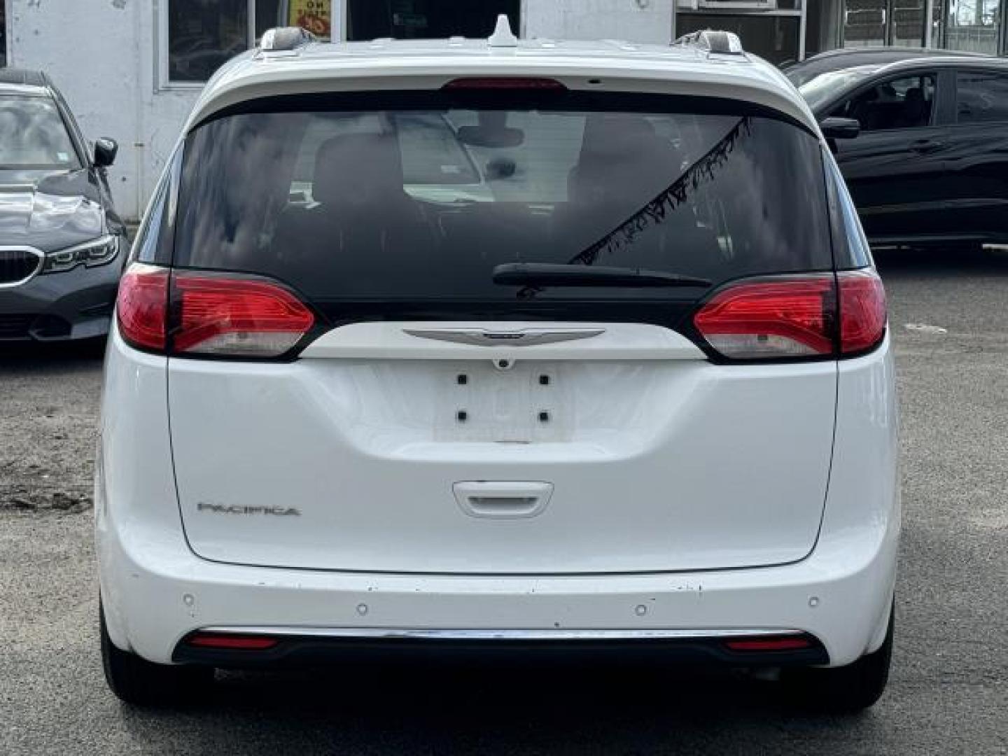 2019 Bright White Clearcoat /Black/Alloy Chrysler Pacifica Touring L FWD (2C4RC1BG2KR) , Automatic transmission, located at 1696 Sunrise Hwy, Bay Shore, NY, 11706, (516) 557-0557, 40.733665, -73.256317 - Photo#13