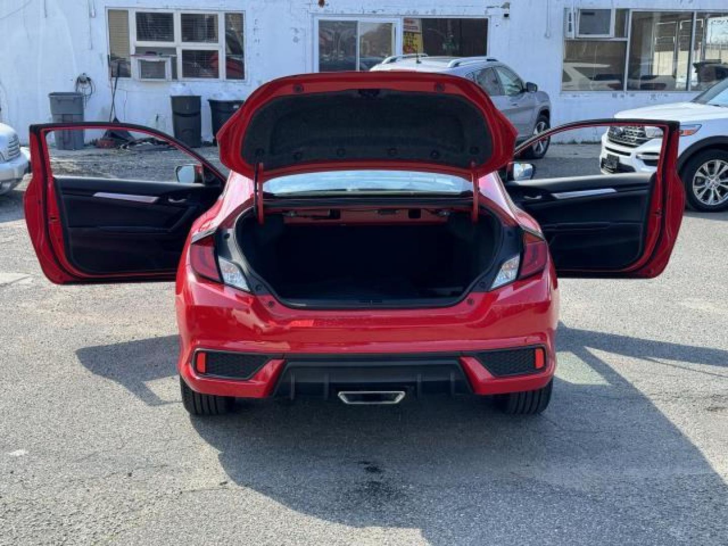 2019 Rallye Red /Black Honda Civic Coupe Sport CVT (2HGFC4B89KH) , Automatic transmission, located at 1696 Sunrise Hwy, Bay Shore, NY, 11706, (516) 557-0557, 40.733665, -73.256317 - We are overstocked and making deals on models such as this 2019 Honda Civic Coupe. This Civic Coupe has been driven with care for 16052 miles. You'll always feel welcome at Auto Connection. If you're ready to make this your next vehicle, contact us to get pre-approved now. All internet purchases in - Photo#10