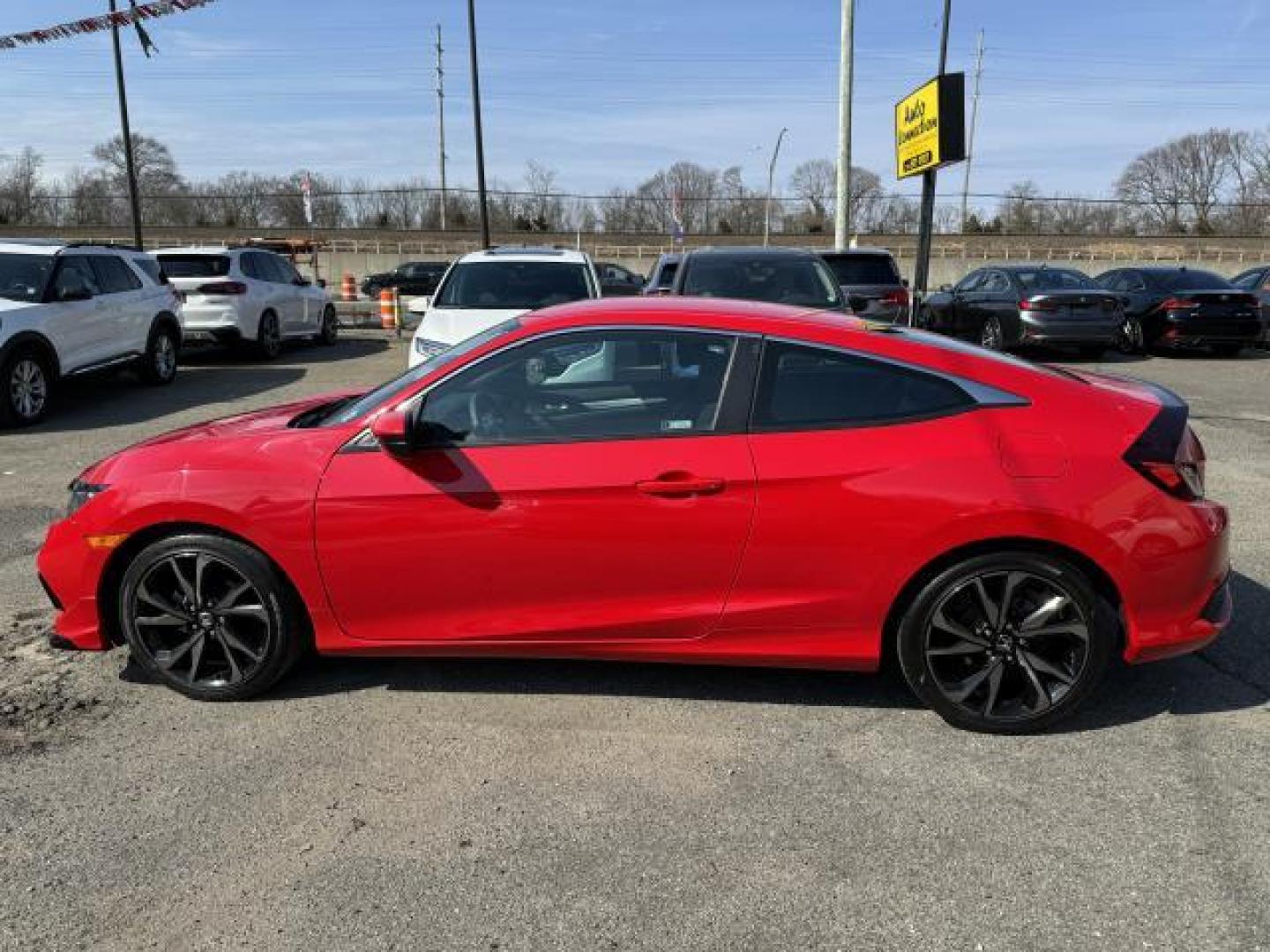 2019 Rallye Red /Black Honda Civic Coupe Sport CVT (2HGFC4B89KH) , Automatic transmission, located at 1696 Sunrise Hwy, Bay Shore, NY, 11706, (516) 557-0557, 40.733665, -73.256317 - We are overstocked and making deals on models such as this 2019 Honda Civic Coupe. This Civic Coupe has been driven with care for 16052 miles. You'll always feel welcome at Auto Connection. If you're ready to make this your next vehicle, contact us to get pre-approved now. All internet purchases in - Photo#11