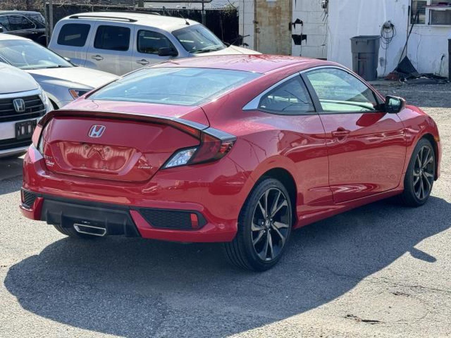 2019 Rallye Red /Black Honda Civic Coupe Sport CVT (2HGFC4B89KH) , Automatic transmission, located at 1696 Sunrise Hwy, Bay Shore, NY, 11706, (516) 557-0557, 40.733665, -73.256317 - We are overstocked and making deals on models such as this 2019 Honda Civic Coupe. This Civic Coupe has been driven with care for 16052 miles. You'll always feel welcome at Auto Connection. If you're ready to make this your next vehicle, contact us to get pre-approved now. All internet purchases in - Photo#12