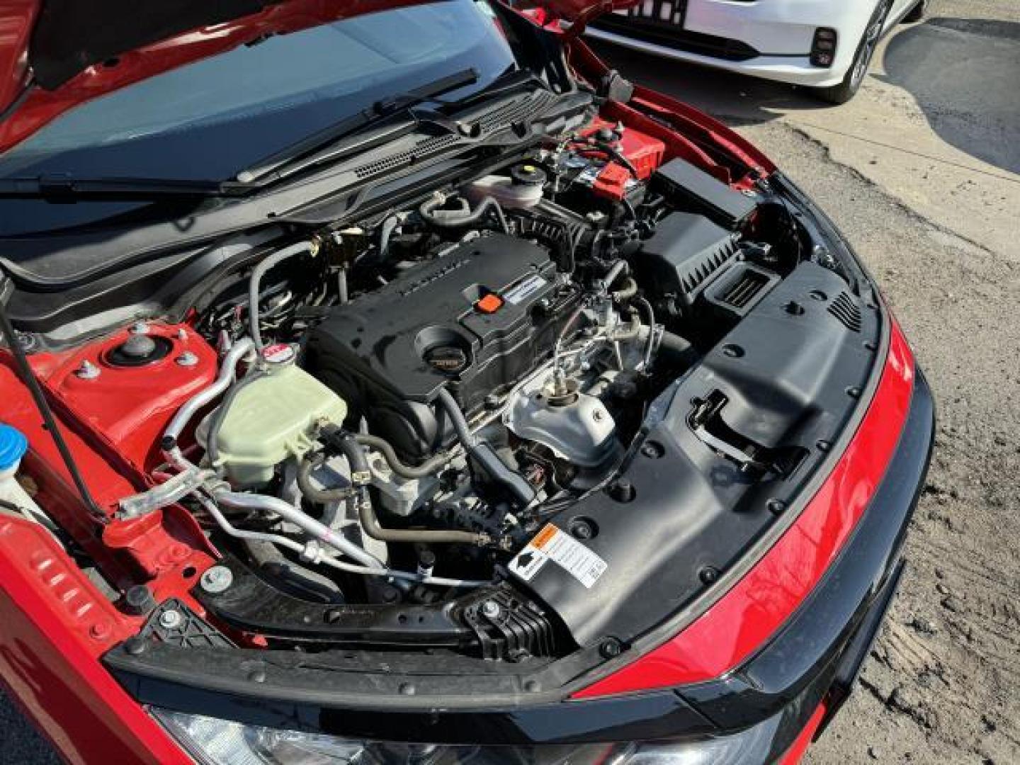 2019 Rallye Red /Black Honda Civic Coupe Sport CVT (2HGFC4B89KH) , Automatic transmission, located at 1696 Sunrise Hwy, Bay Shore, NY, 11706, (516) 557-0557, 40.733665, -73.256317 - We are overstocked and making deals on models such as this 2019 Honda Civic Coupe. This Civic Coupe has been driven with care for 16052 miles. You'll always feel welcome at Auto Connection. If you're ready to make this your next vehicle, contact us to get pre-approved now. All internet purchases in - Photo#33