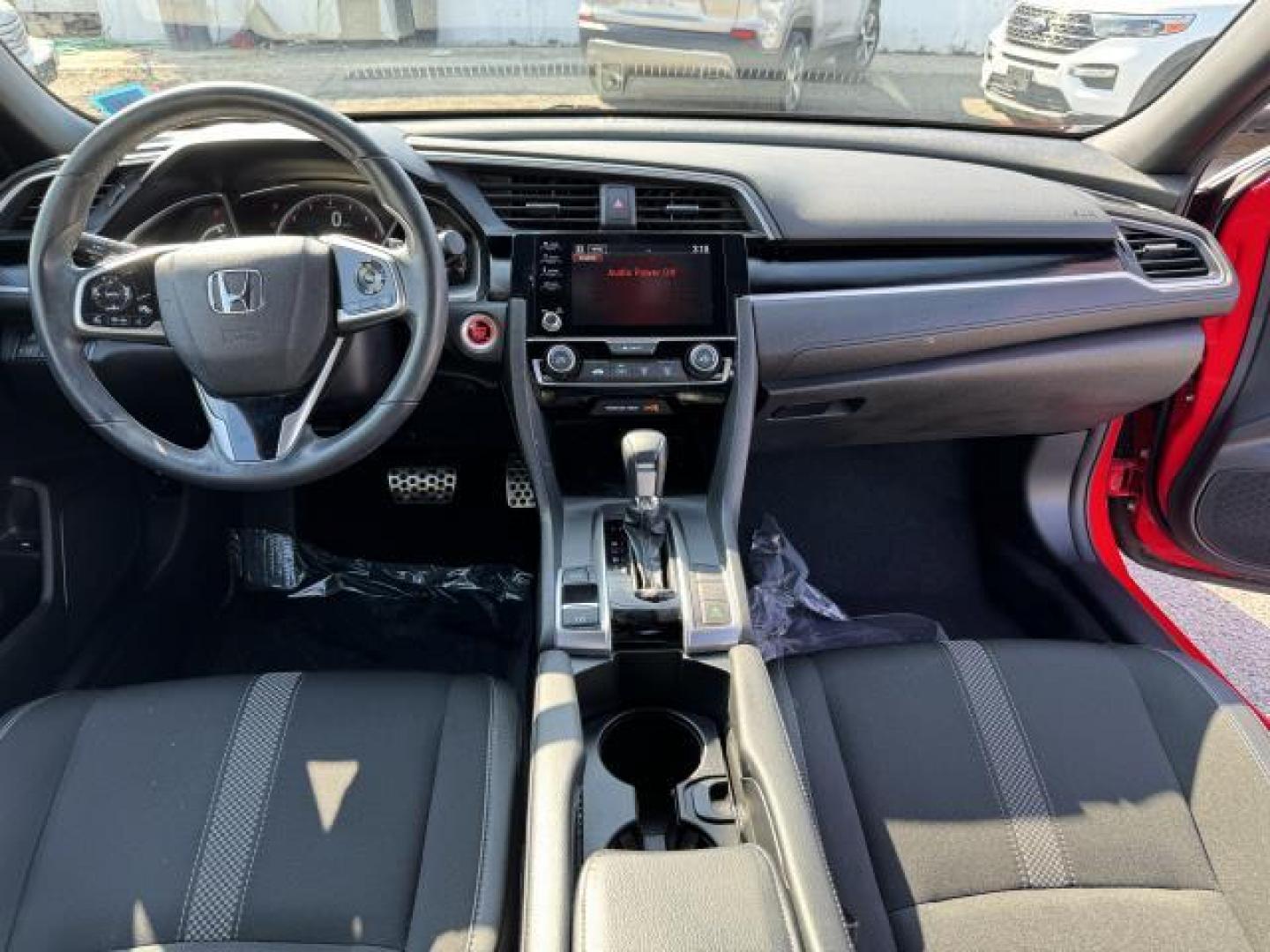 2019 Rallye Red /Black Honda Civic Coupe Sport CVT (2HGFC4B89KH) , Automatic transmission, located at 1696 Sunrise Hwy, Bay Shore, NY, 11706, (516) 557-0557, 40.733665, -73.256317 - We are overstocked and making deals on models such as this 2019 Honda Civic Coupe. This Civic Coupe has been driven with care for 16052 miles. You'll always feel welcome at Auto Connection. If you're ready to make this your next vehicle, contact us to get pre-approved now. All internet purchases in - Photo#7