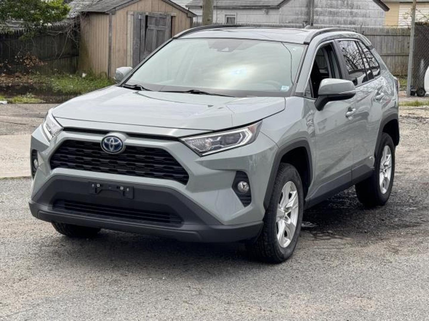 2021 Lunar Rock /Black Toyota RAV4 Hybrid XLE AWD (Natl) (2T3RWRFV1MW) , Automatic transmission, located at 1696 Sunrise Hwy, Bay Shore, NY, 11706, (516) 557-0557, 40.733665, -73.256317 - Form meets function with the 2021 Toyota RAV4. This RAV4 has 32789 miles, and it has plenty more to go with you behind the wheel. Visit us to learn how you can add this vehicle to your family lineup. Are you ready to take home the car of your dreams? We're ready to help you. All internet purchases - Photo#11