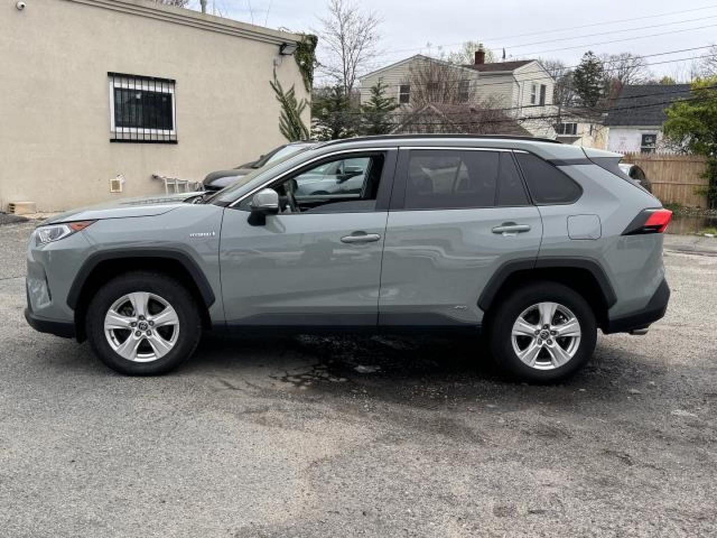 2021 Lunar Rock /Black Toyota RAV4 Hybrid XLE AWD (Natl) (2T3RWRFV1MW) , Automatic transmission, located at 1696 Sunrise Hwy, Bay Shore, NY, 11706, (516) 557-0557, 40.733665, -73.256317 - Form meets function with the 2021 Toyota RAV4. This RAV4 has 32789 miles, and it has plenty more to go with you behind the wheel. Visit us to learn how you can add this vehicle to your family lineup. Are you ready to take home the car of your dreams? We're ready to help you. All internet purchases - Photo#12