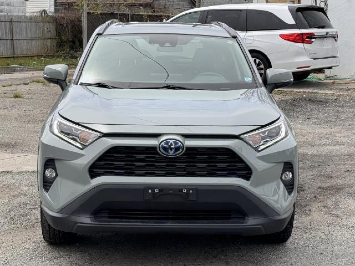 2021 Lunar Rock /Black Toyota RAV4 Hybrid XLE AWD (Natl) (2T3RWRFV1MW) , Automatic transmission, located at 1696 Sunrise Hwy, Bay Shore, NY, 11706, (516) 557-0557, 40.733665, -73.256317 - Photo#2