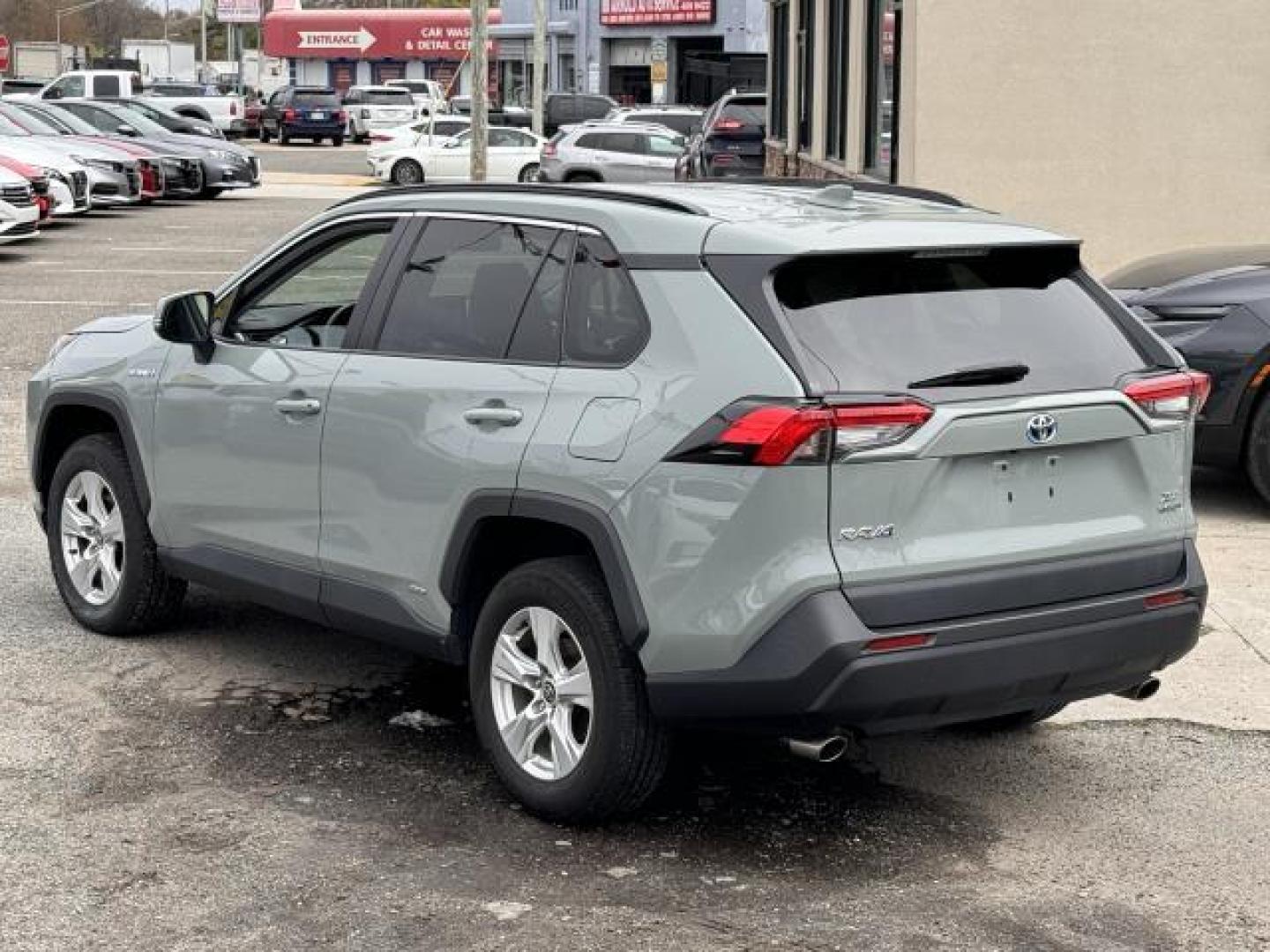 2021 Lunar Rock /Black Toyota RAV4 Hybrid XLE AWD (Natl) (2T3RWRFV1MW) , Automatic transmission, located at 1696 Sunrise Hwy, Bay Shore, NY, 11706, (516) 557-0557, 40.733665, -73.256317 - Form meets function with the 2021 Toyota RAV4. This RAV4 has 32789 miles, and it has plenty more to go with you behind the wheel. Visit us to learn how you can add this vehicle to your family lineup. Are you ready to take home the car of your dreams? We're ready to help you. All internet purchases - Photo#4