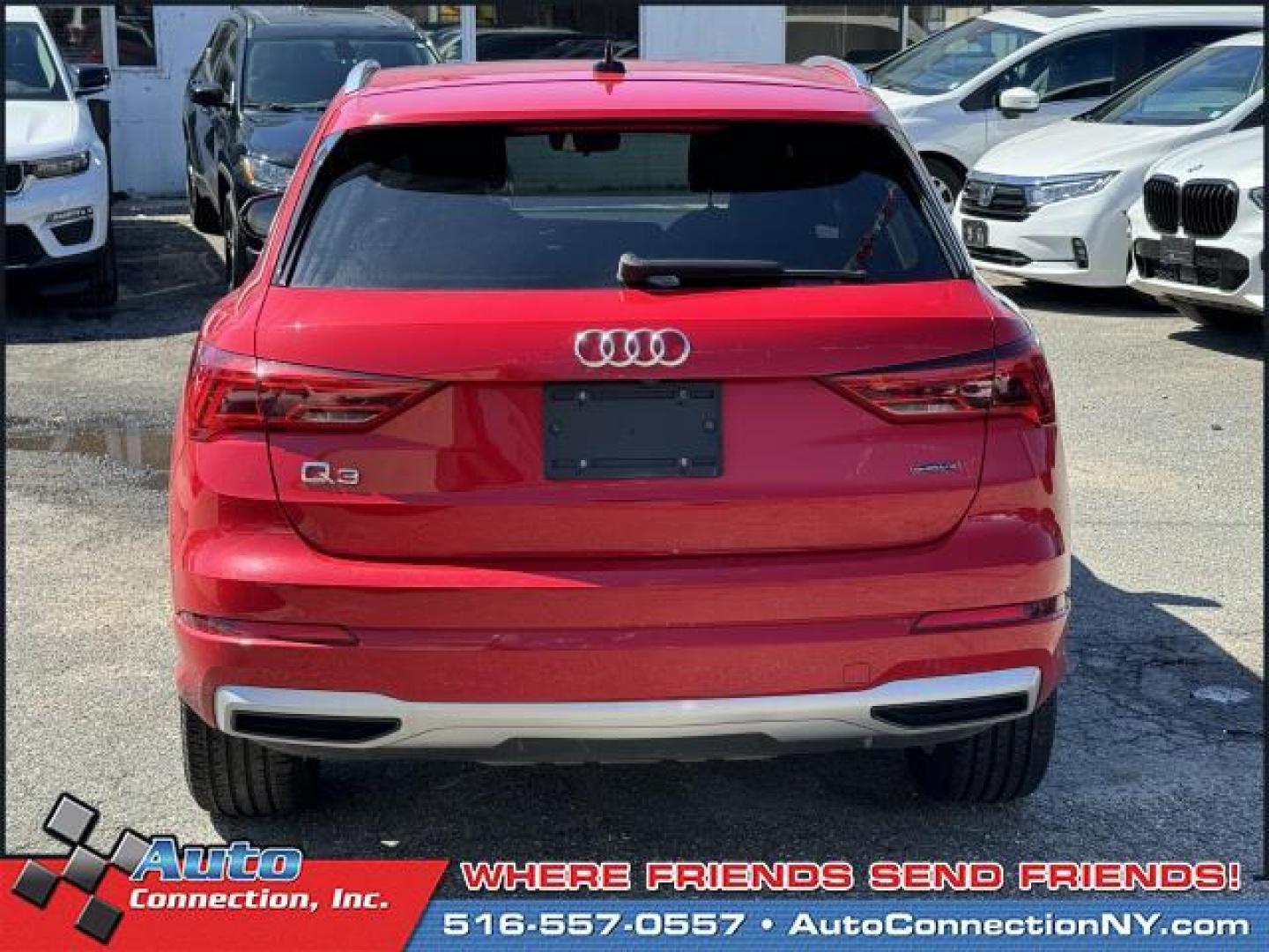 2021 Tango Red Metallic /Black Audi Q3 Premium 40 TFSI quattro (WA1AUCF35M1) , Automatic transmission, located at 1696 Sunrise Hwy, Bay Shore, NY, 11706, (516) 557-0557, 40.733665, -73.256317 - This 2021 Audi Q3 is in great mechanical and physical condition. Curious about how far this Q3 has been driven? The odometer reads 58625 miles. Visit us to learn how you can add this vehicle to your family lineup. Appointments are recommended due to the fast turnover on models such as this one. All - Photo#13