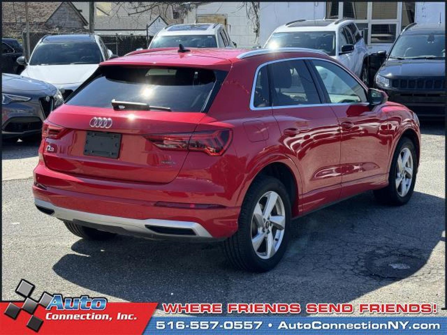 2021 Tango Red Metallic /Black Audi Q3 Premium 40 TFSI quattro (WA1AUCF35M1) , Automatic transmission, located at 1696 Sunrise Hwy, Bay Shore, NY, 11706, (516) 557-0557, 40.733665, -73.256317 - This 2021 Audi Q3 is in great mechanical and physical condition. Curious about how far this Q3 has been driven? The odometer reads 58625 miles. Visit us to learn how you can add this vehicle to your family lineup. Appointments are recommended due to the fast turnover on models such as this one. All - Photo#14