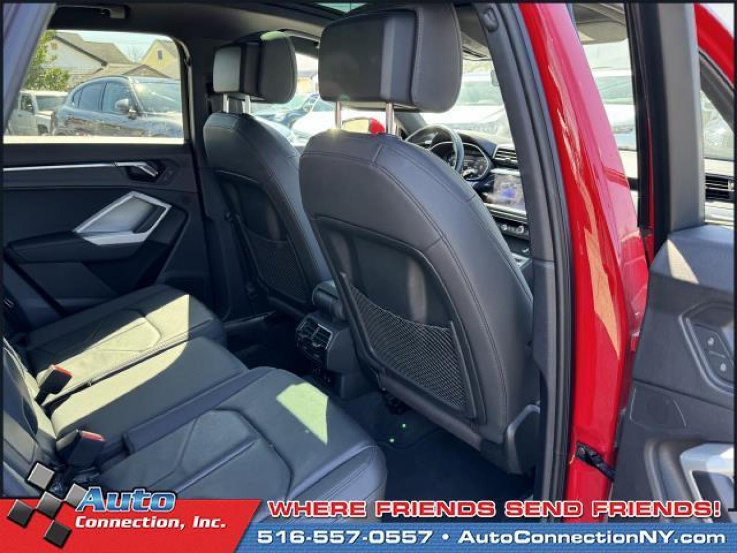 2021 Tango Red Metallic /Black Audi Q3 Premium 40 TFSI quattro (WA1AUCF35M1) , Automatic transmission, located at 1696 Sunrise Hwy, Bay Shore, NY, 11706, (516) 557-0557, 40.733665, -73.256317 - This 2021 Audi Q3 is in great mechanical and physical condition. Curious about how far this Q3 has been driven? The odometer reads 58625 miles. Visit us to learn how you can add this vehicle to your family lineup. Appointments are recommended due to the fast turnover on models such as this one. All - Photo#17