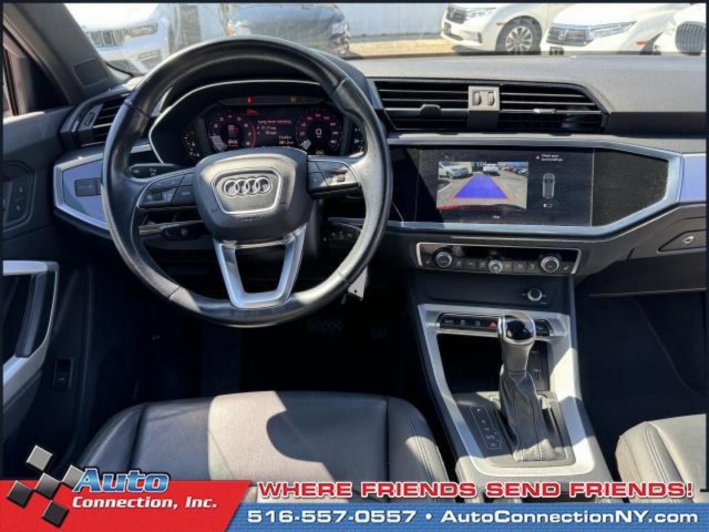 2021 Tango Red Metallic /Black Audi Q3 Premium 40 TFSI quattro (WA1AUCF35M1) , Automatic transmission, located at 1696 Sunrise Hwy, Bay Shore, NY, 11706, (516) 557-0557, 40.733665, -73.256317 - This 2021 Audi Q3 is in great mechanical and physical condition. Curious about how far this Q3 has been driven? The odometer reads 58625 miles. Visit us to learn how you can add this vehicle to your family lineup. Appointments are recommended due to the fast turnover on models such as this one. All - Photo#20