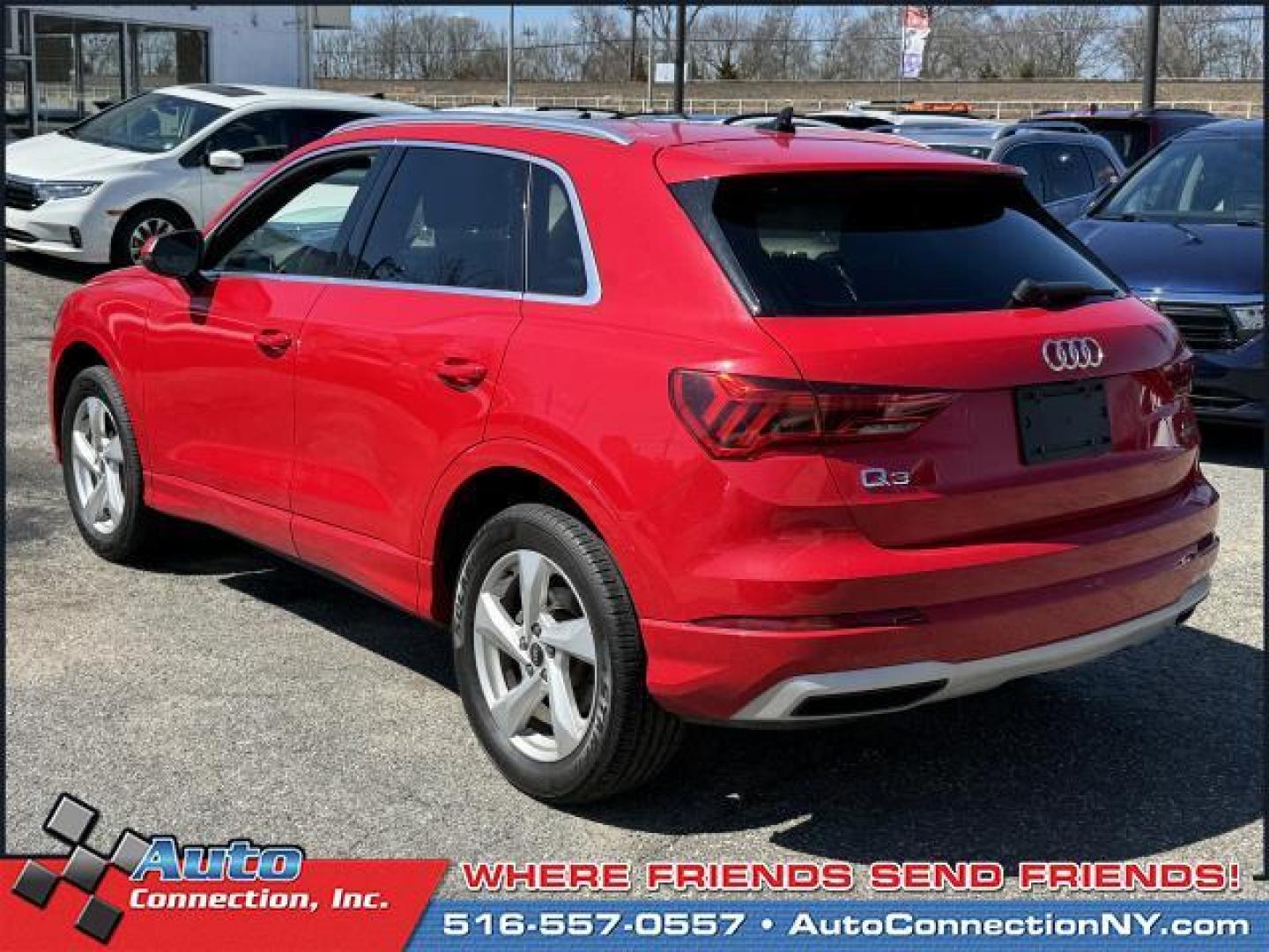 2021 Tango Red Metallic /Black Audi Q3 Premium 40 TFSI quattro (WA1AUCF35M1) , Automatic transmission, located at 1696 Sunrise Hwy, Bay Shore, NY, 11706, (516) 557-0557, 40.733665, -73.256317 - This 2021 Audi Q3 is in great mechanical and physical condition. Curious about how far this Q3 has been driven? The odometer reads 58625 miles. Visit us to learn how you can add this vehicle to your family lineup. Appointments are recommended due to the fast turnover on models such as this one. All - Photo#4