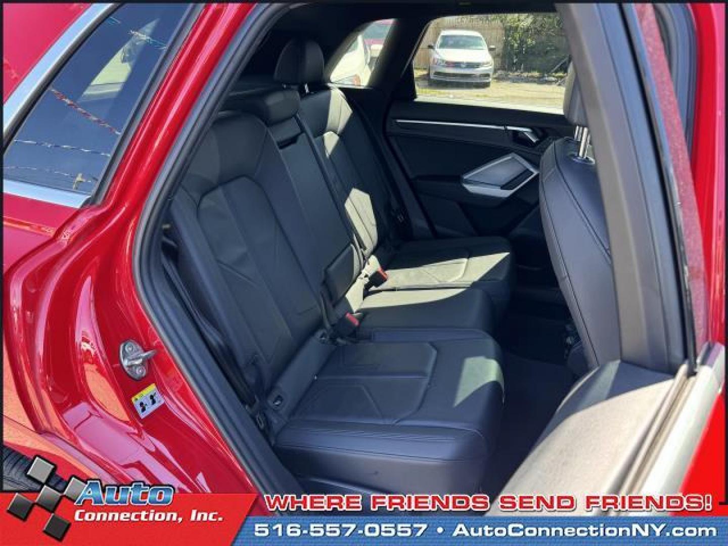 2021 Tango Red Metallic /Black Audi Q3 Premium 40 TFSI quattro (WA1AUCF35M1) , Automatic transmission, located at 1696 Sunrise Hwy, Bay Shore, NY, 11706, (516) 557-0557, 40.733665, -73.256317 - This 2021 Audi Q3 is in great mechanical and physical condition. Curious about how far this Q3 has been driven? The odometer reads 58625 miles. Visit us to learn how you can add this vehicle to your family lineup. Appointments are recommended due to the fast turnover on models such as this one. All - Photo#6