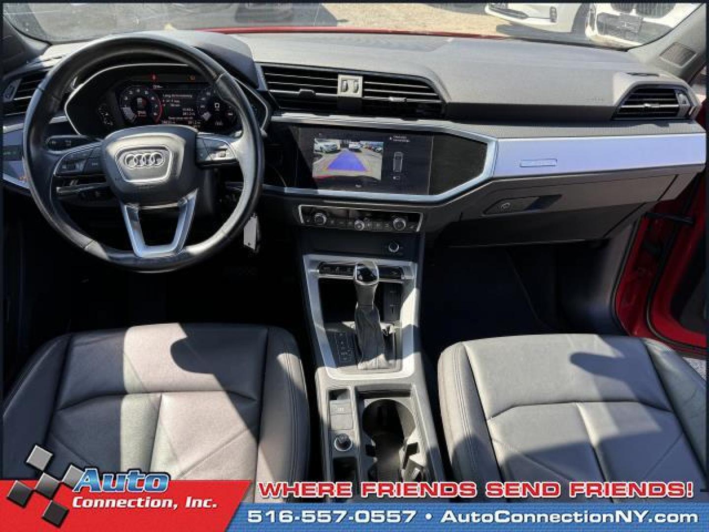 2021 Tango Red Metallic /Black Audi Q3 Premium 40 TFSI quattro (WA1AUCF35M1) , Automatic transmission, located at 1696 Sunrise Hwy, Bay Shore, NY, 11706, (516) 557-0557, 40.733665, -73.256317 - This 2021 Audi Q3 is in great mechanical and physical condition. Curious about how far this Q3 has been driven? The odometer reads 58625 miles. Visit us to learn how you can add this vehicle to your family lineup. Appointments are recommended due to the fast turnover on models such as this one. All - Photo#7