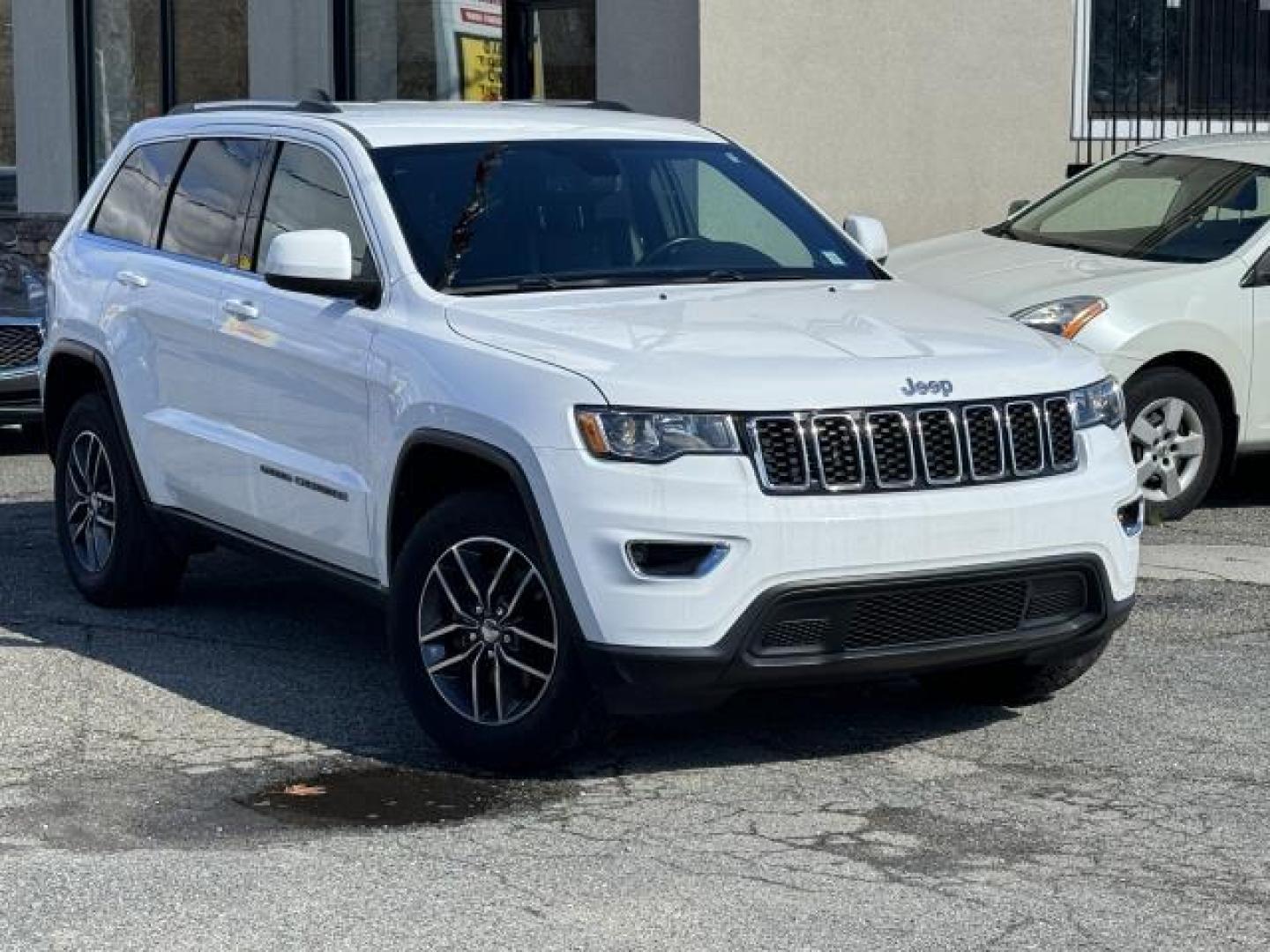 2018 Bright White Clearcoat /Black Jeep Grand Cherokee Laredo E 4x4 *Ltd Avail* (1C4RJFAG3JC) , Automatic transmission, located at 1696 Sunrise Hwy, Bay Shore, NY, 11706, (516) 557-0557, 40.733665, -73.256317 - Photo#0