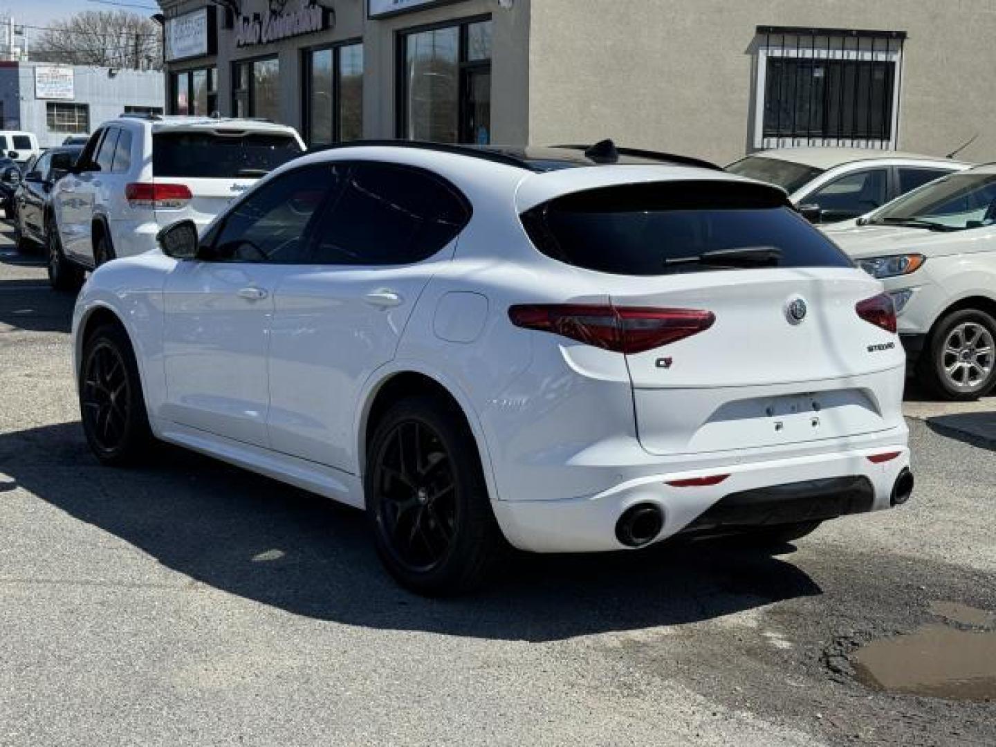 2020 Alfa White /Black Alfa Romeo Stelvio Ti AWD (ZASPAKBN9L7) , Automatic transmission, located at 1696 Sunrise Hwy, Bay Shore, NY, 11706, (516) 557-0557, 40.733665, -73.256317 - After you get a look at this beautiful 2020 Alfa Romeo Stelvio, you'll wonder what took you so long to go check it out! This Stelvio offers you 46884 miles, and will be sure to give you many more. You'll always feel welcome at Auto Connection. Get a fast and easy price quote. All internet purchases - Photo#4