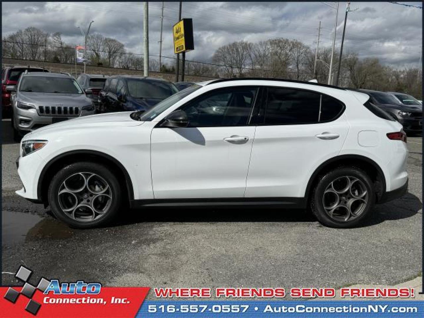 2021 Alfa White /Black/Red Alfa Romeo Stelvio AWD (ZASPAKAN7M7) , Automatic transmission, located at 1696 Sunrise Hwy, Bay Shore, NY, 11706, (516) 557-0557, 40.733665, -73.256317 - Photo#12