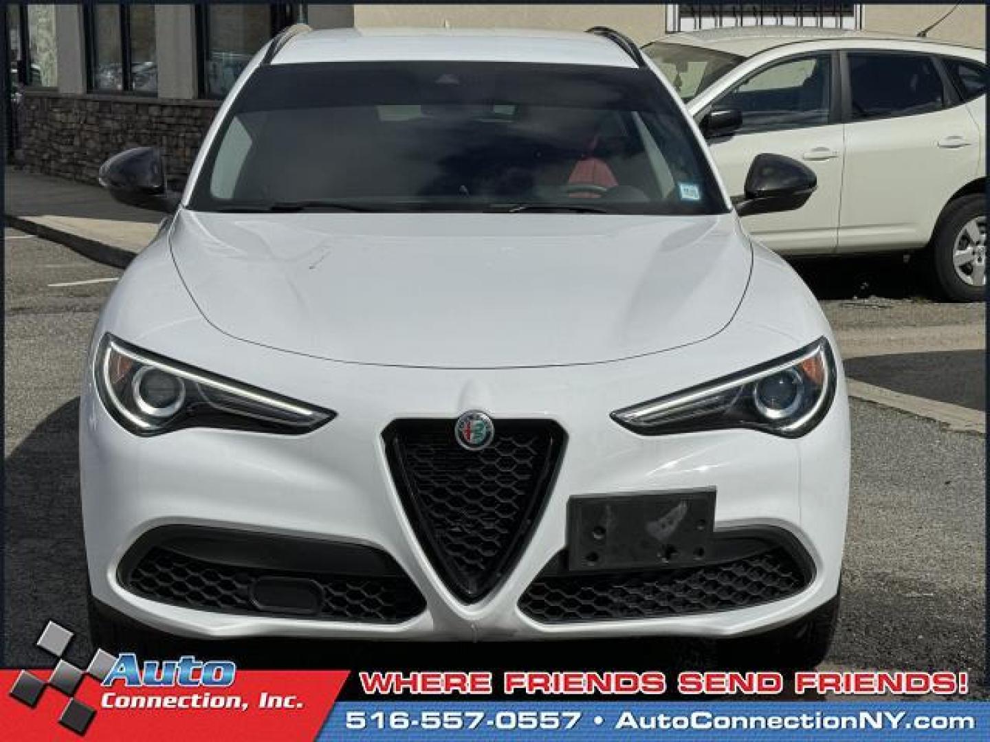 2021 Alfa White /Black/Red Alfa Romeo Stelvio AWD (ZASPAKAN7M7) , Automatic transmission, located at 1696 Sunrise Hwy, Bay Shore, NY, 11706, (516) 557-0557, 40.733665, -73.256317 - Photo#2