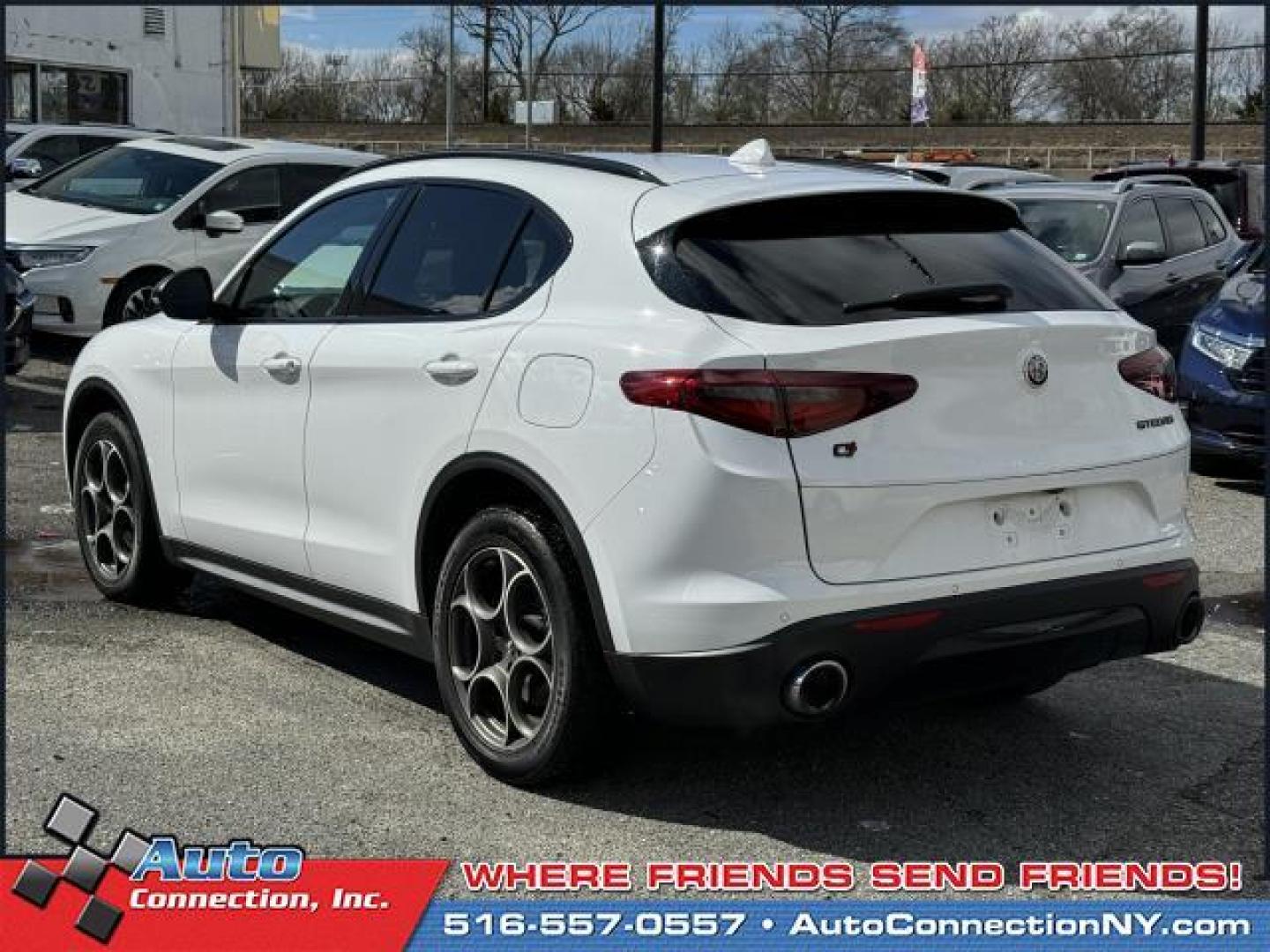 2021 Alfa White /Black/Red Alfa Romeo Stelvio AWD (ZASPAKAN7M7) , Automatic transmission, located at 1696 Sunrise Hwy, Bay Shore, NY, 11706, (516) 557-0557, 40.733665, -73.256317 - Photo#4