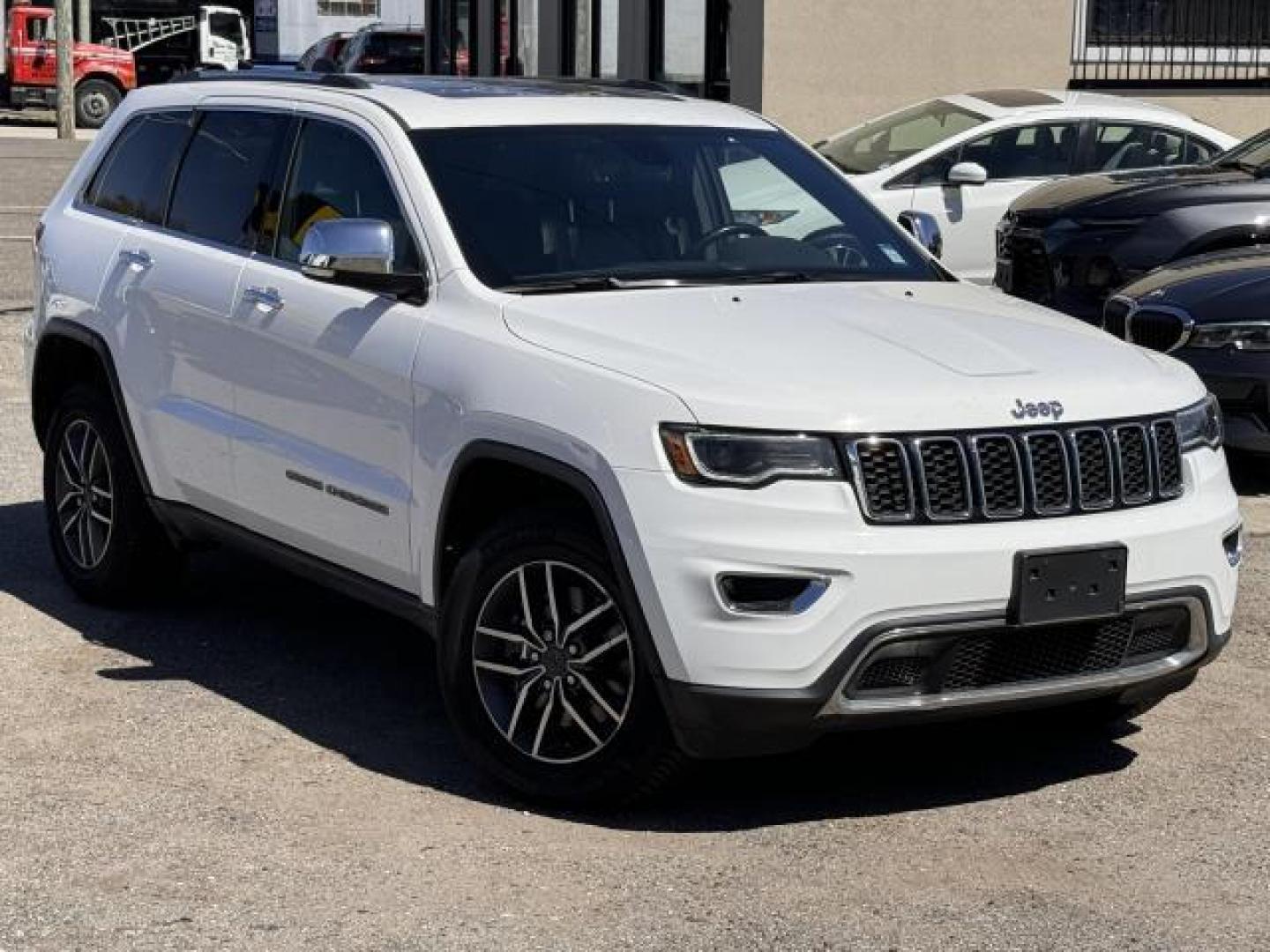 2021 Bright White Clearcoat /Black Jeep Grand Cherokee Limited 4x4 (1C4RJFBG4MC) , Automatic transmission, located at 1696 Sunrise Hwy, Bay Shore, NY, 11706, (516) 557-0557, 40.733665, -73.256317 - You'll enjoy the open roads and city streets in this 2021 Jeep Grand Cherokee. This Grand Cherokee has been driven with care for 58938 miles. Visit us to learn how you can add this vehicle to your family lineup. Schedule now for a test drive before this model is gone. All internet purchases include - Photo#0