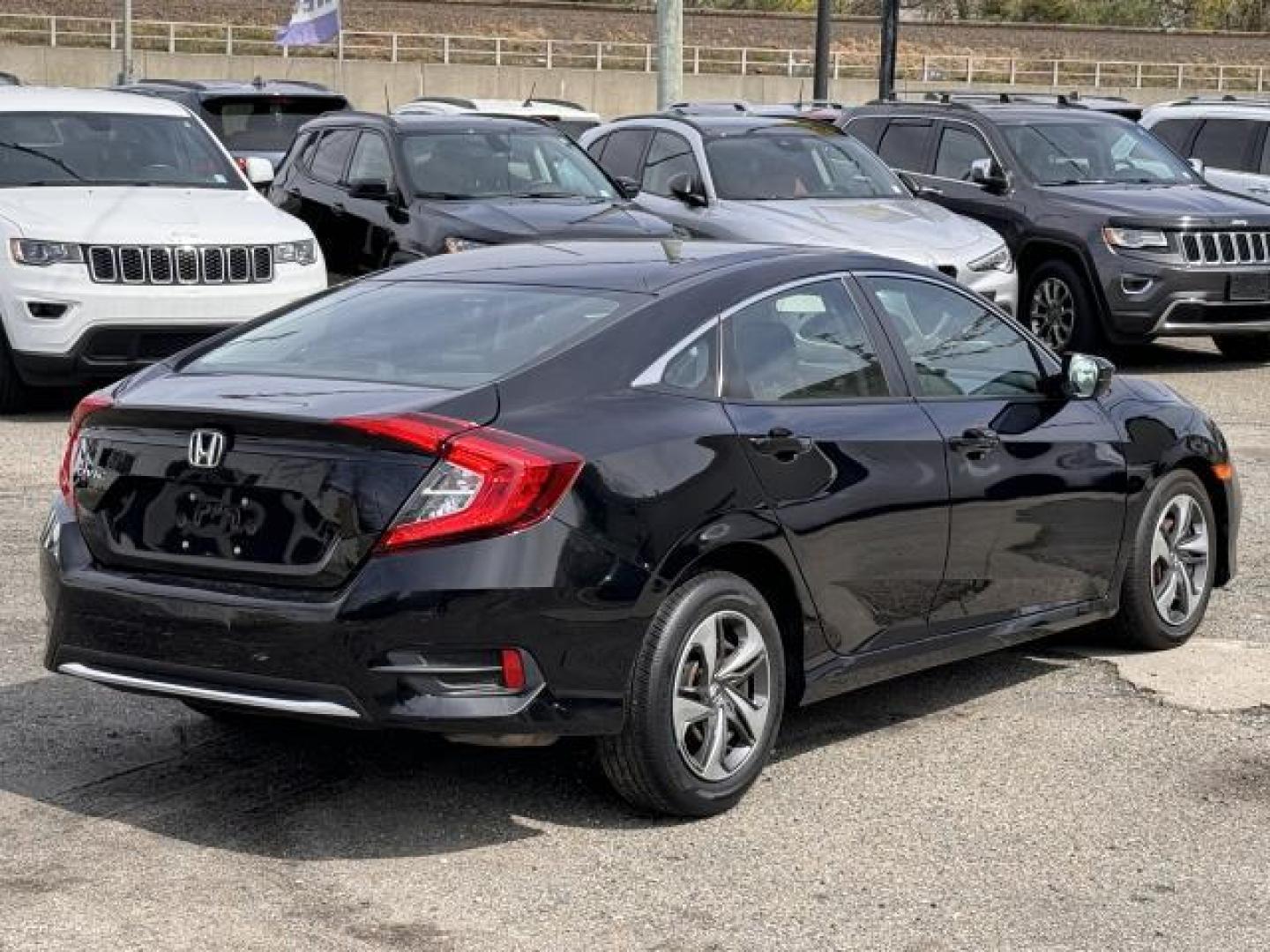 2020 Crystal Black Pearl /Black Honda Civic Sedan LX CVT (2HGFC2F65LH) , Automatic transmission, located at 1696 Sunrise Hwy, Bay Shore, NY, 11706, (516) 557-0557, 40.733665, -73.256317 - This 2020 Honda Civic Sedan has all you've been looking for and more! This Civic Sedan has 24390 miles. Real cars. Real prices. Real people. The open road is calling! Drive it home today. All internet purchases include a 12 mo/ 12000 mile protection plan. All internet purchase prices are displayed - Photo#14