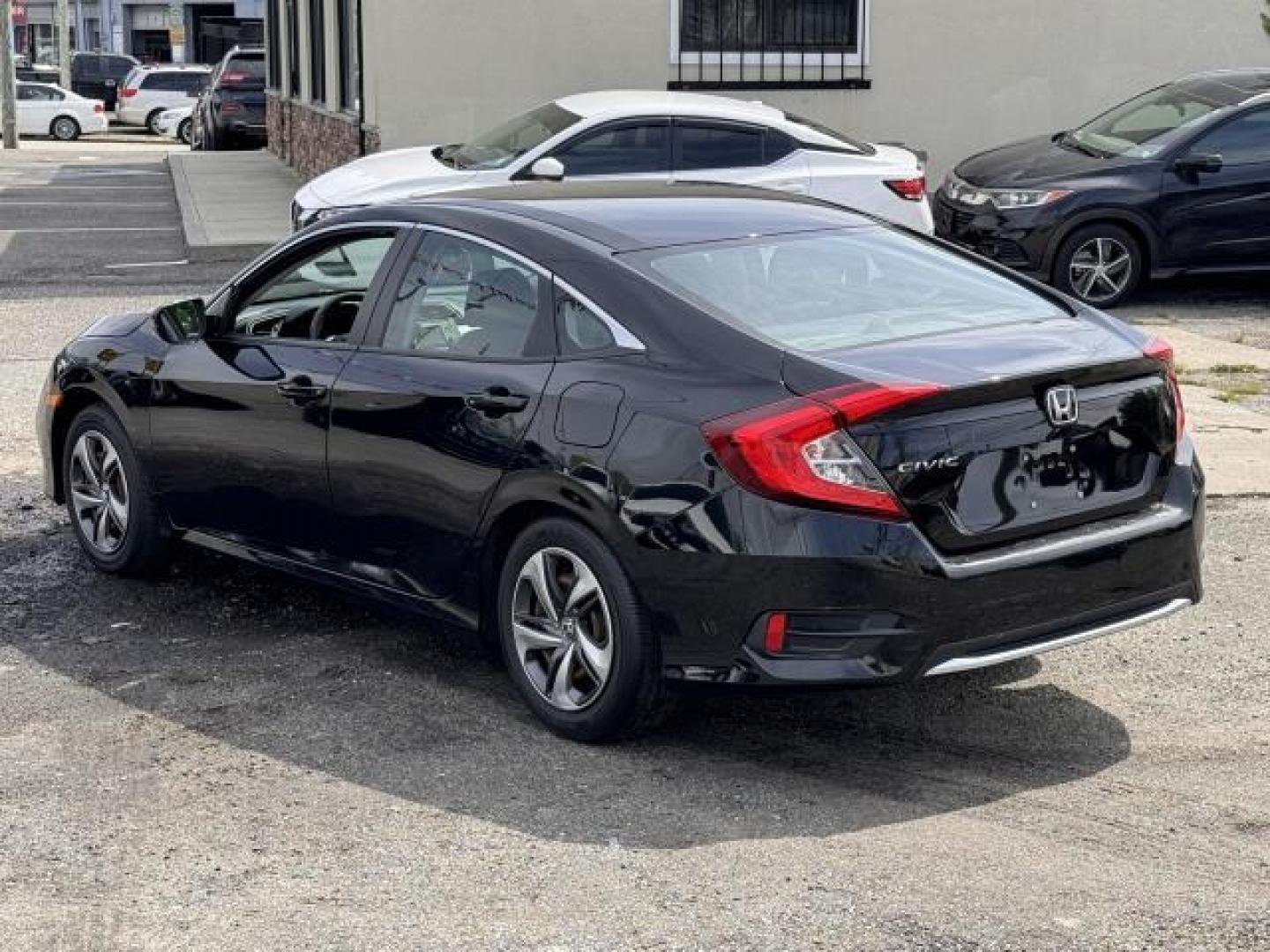 2020 Crystal Black Pearl /Black Honda Civic Sedan LX CVT (2HGFC2F65LH) , Automatic transmission, located at 1696 Sunrise Hwy, Bay Shore, NY, 11706, (516) 557-0557, 40.733665, -73.256317 - This 2020 Honda Civic Sedan has all you've been looking for and more! This Civic Sedan has 24390 miles. Real cars. Real prices. Real people. The open road is calling! Drive it home today. All internet purchases include a 12 mo/ 12000 mile protection plan. All internet purchase prices are displayed - Photo#4